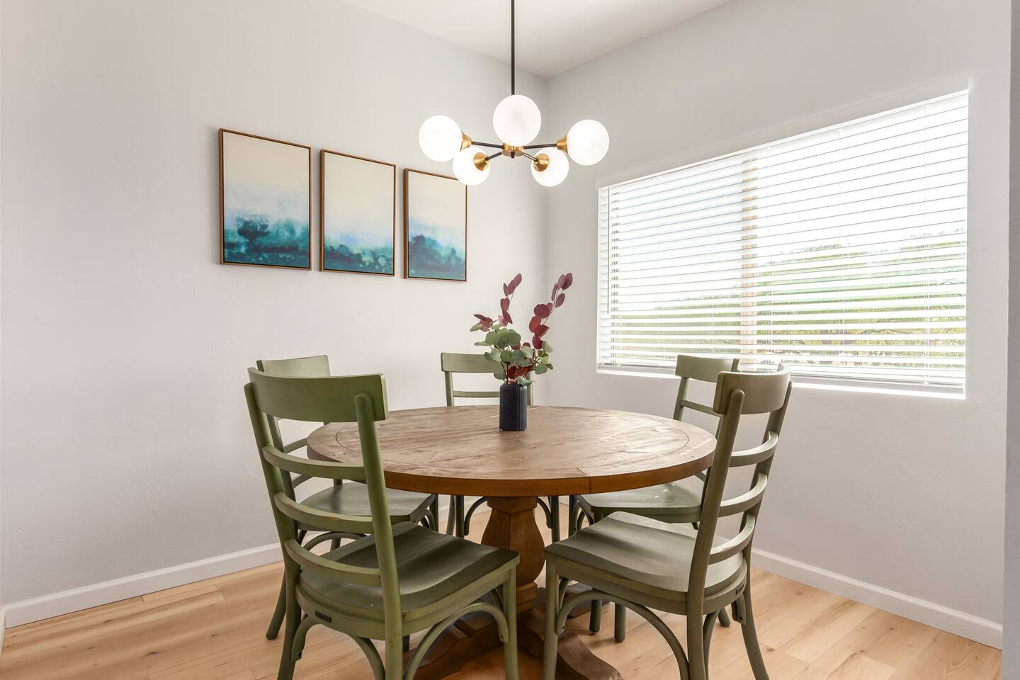 Start your day in the inviting breakfast nook, just off the kitchen. With a round table and seating for five, it’s the perfect spot to enjoy morning coffee and a relaxed meal together.