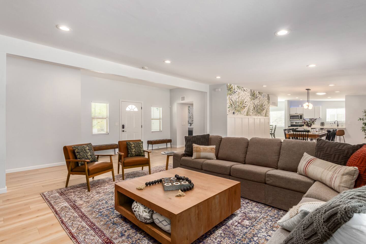 Kick off your shoes and sink into relaxation. This is where the day slows down, where conversations linger, laughter echoes, and everyone naturally gathers after a day in the Tucson sun.