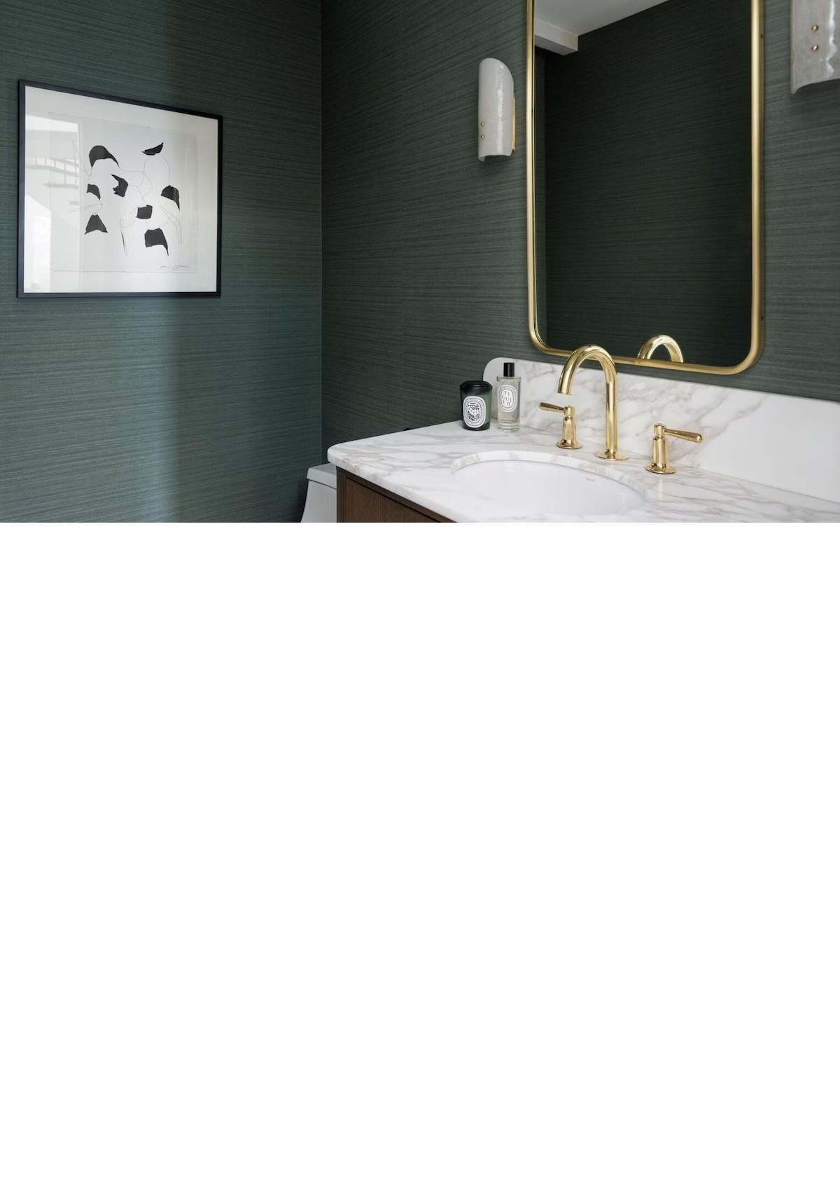 Elegant marble vanity with brass finishes and designer bathroom style