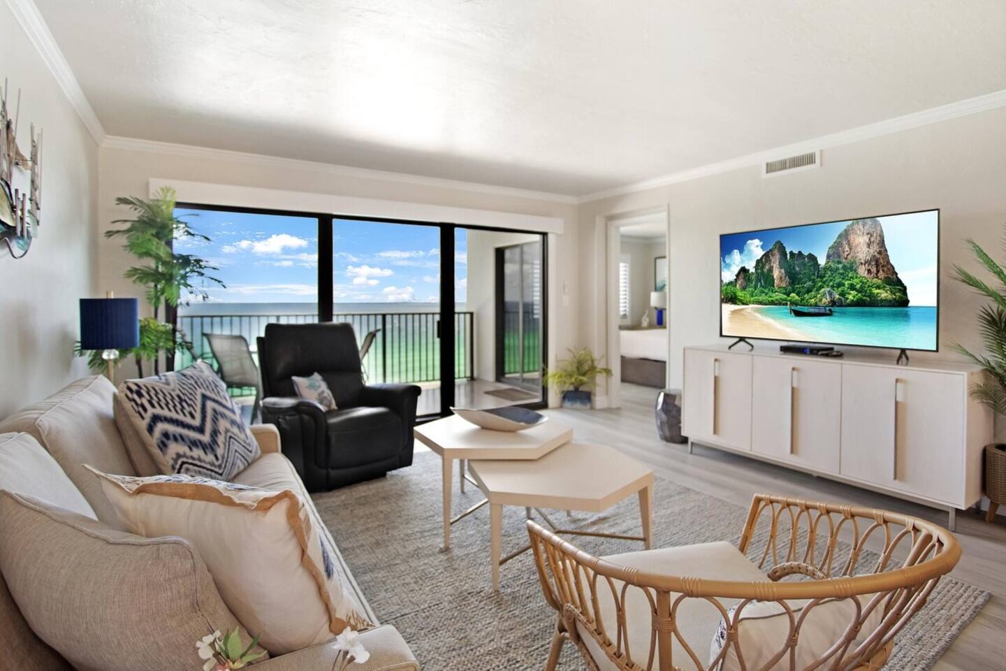 Main living area with Gulf View and a 75 Inch Smart TV.