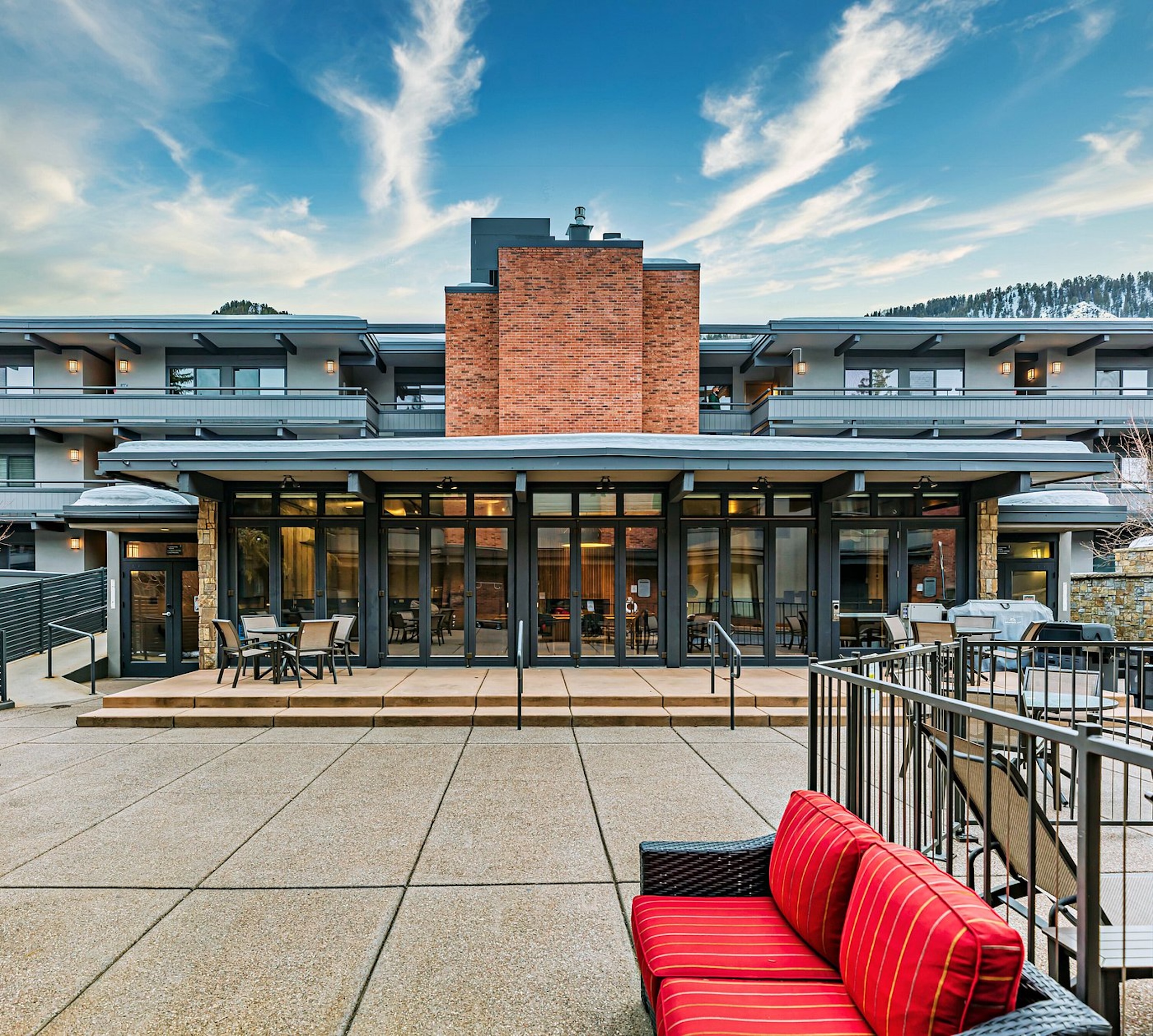 Spacious modern patio with outdoor seating and stylish lodge ambiance