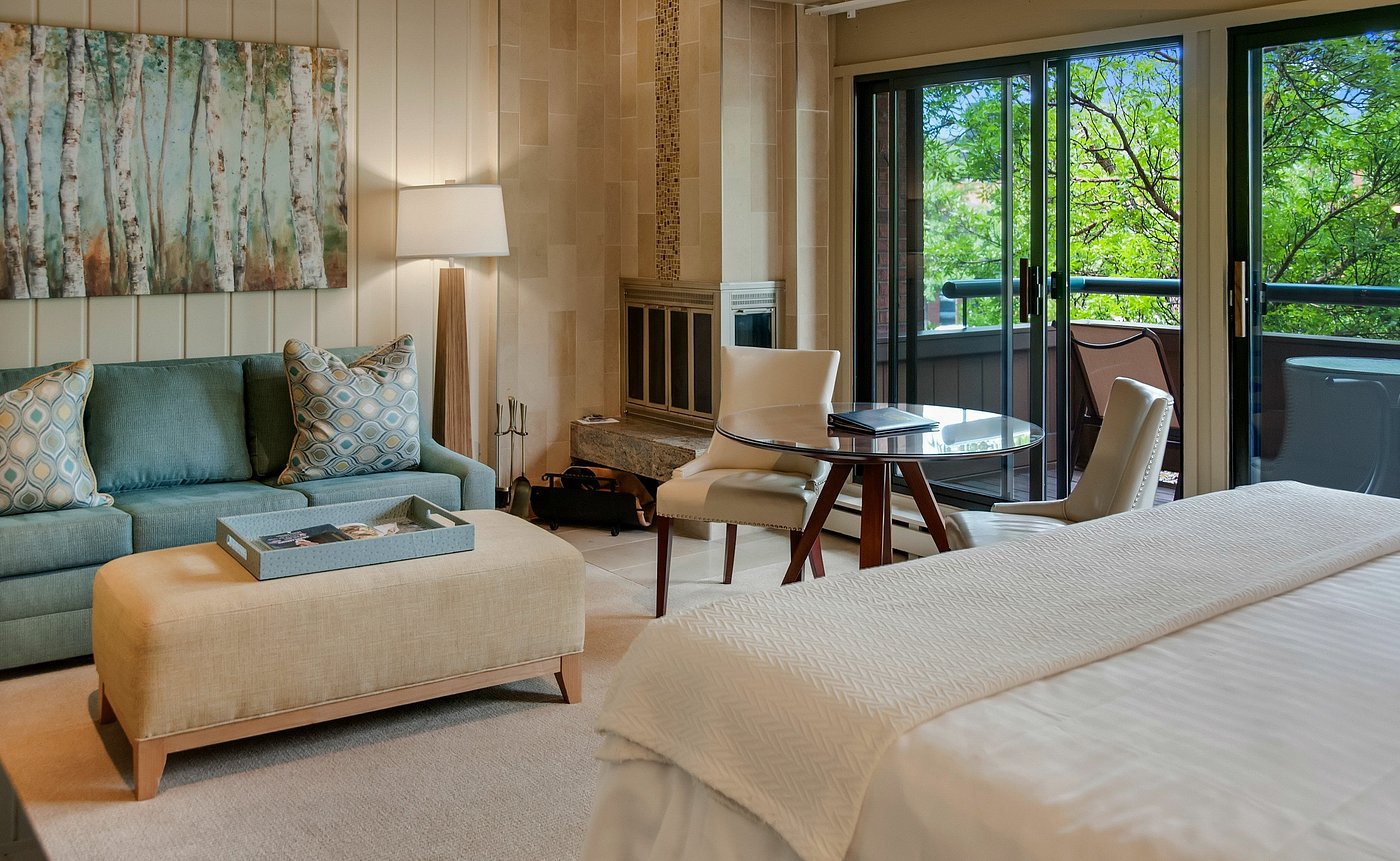 Cozy studio retreat with fireplace and private balcony views
