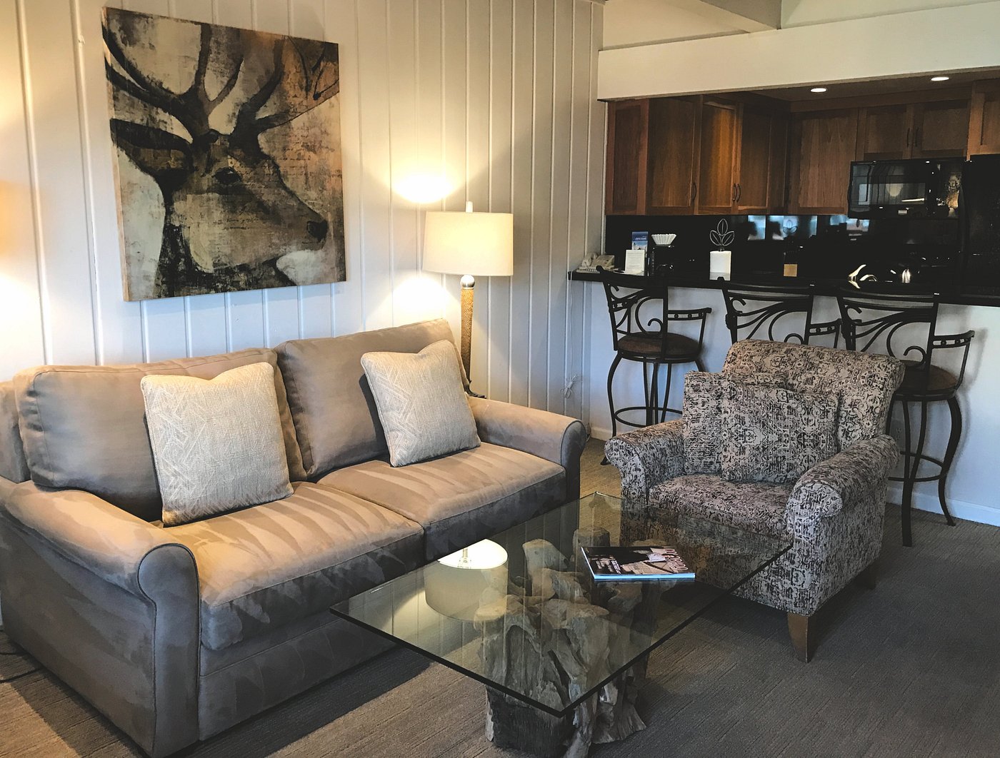 Cozy lodge-style living room with breakfast bar seating