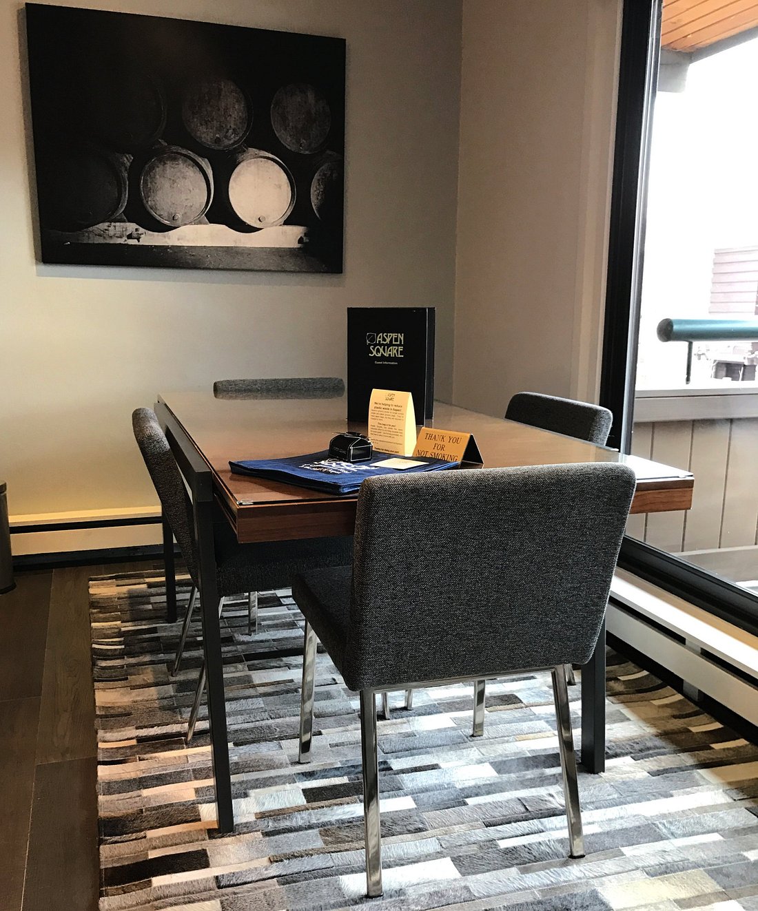 Cozy modern dining nook with natural light and stylish seating