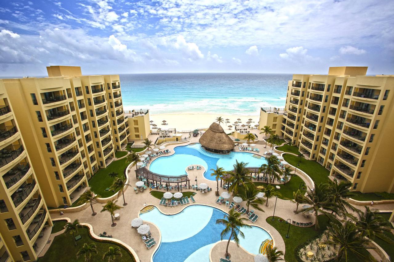 Resort-style pools, tropical grounds, and breathtaking beachfront views