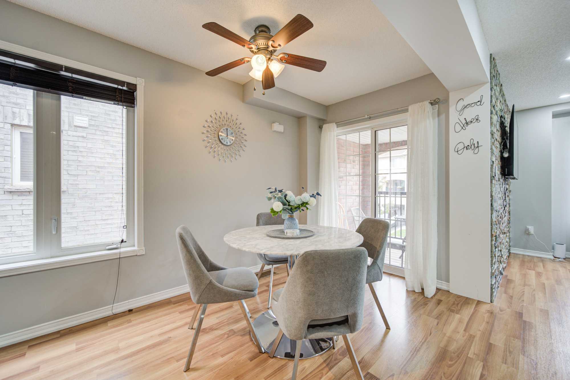 Bright dining nook with natural light and patio access