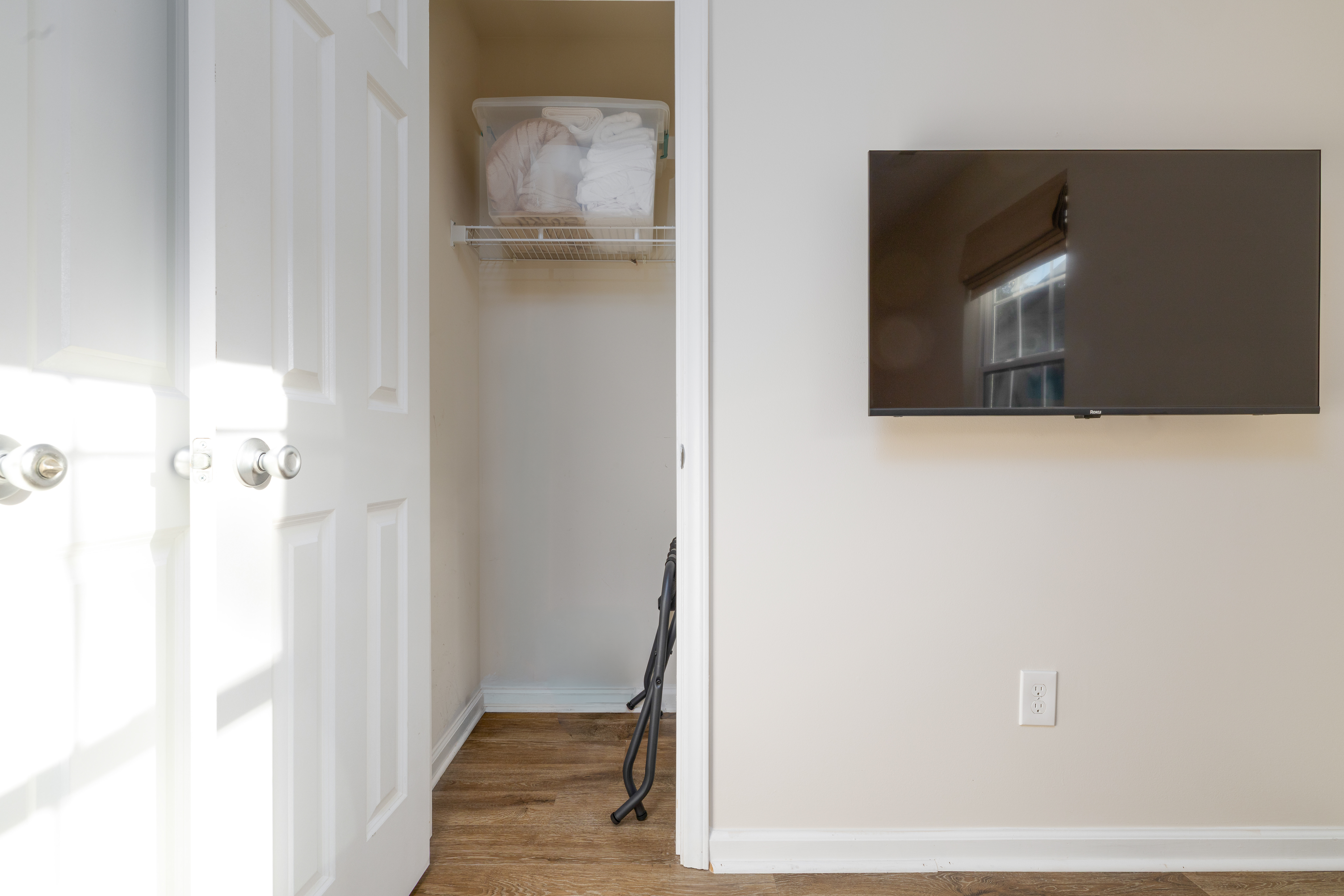 Bedroom 2: 43-inch smart TV and a closet with extra linens