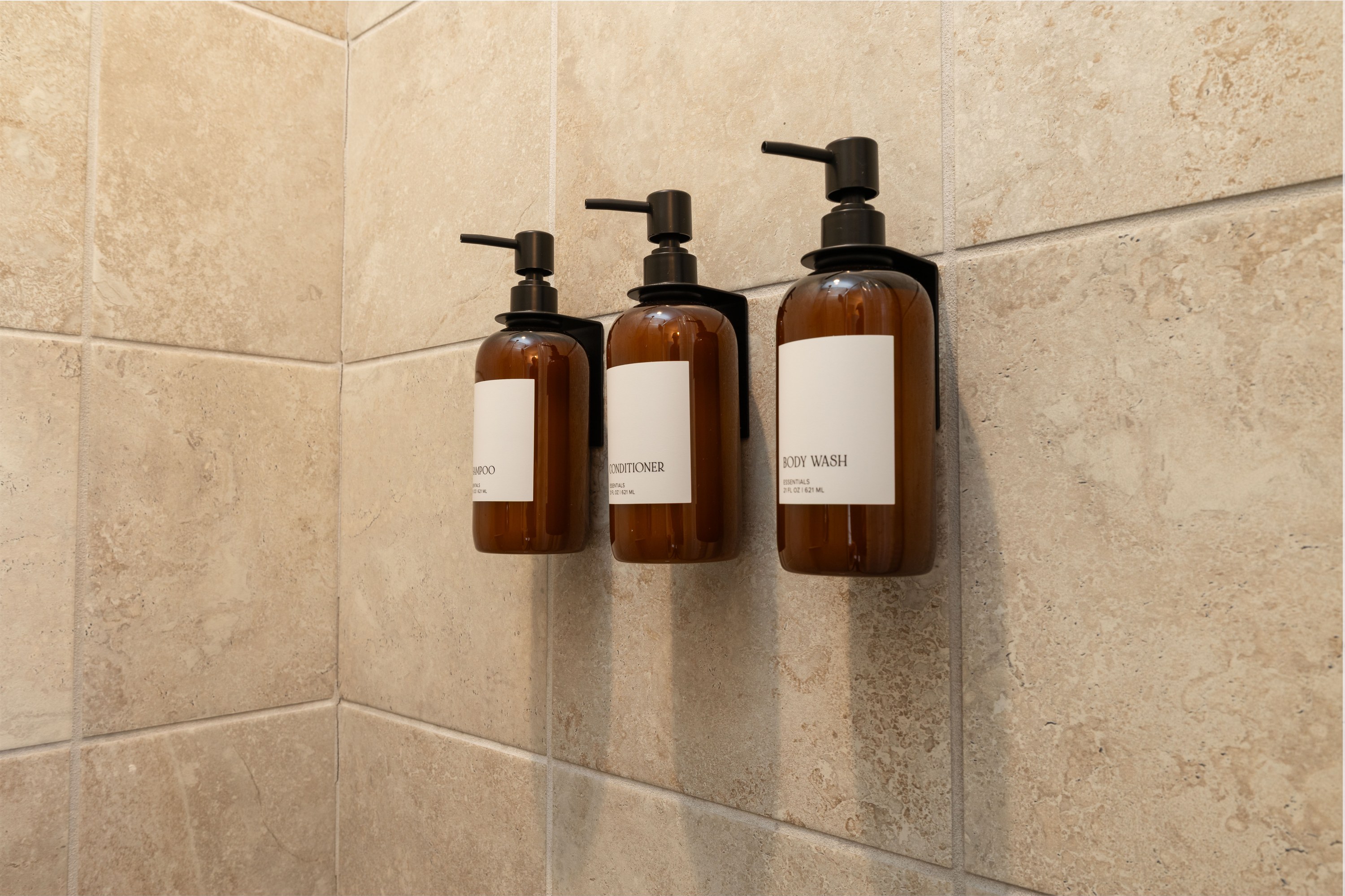 Shampoo, conditioner and body wash in the primary shower