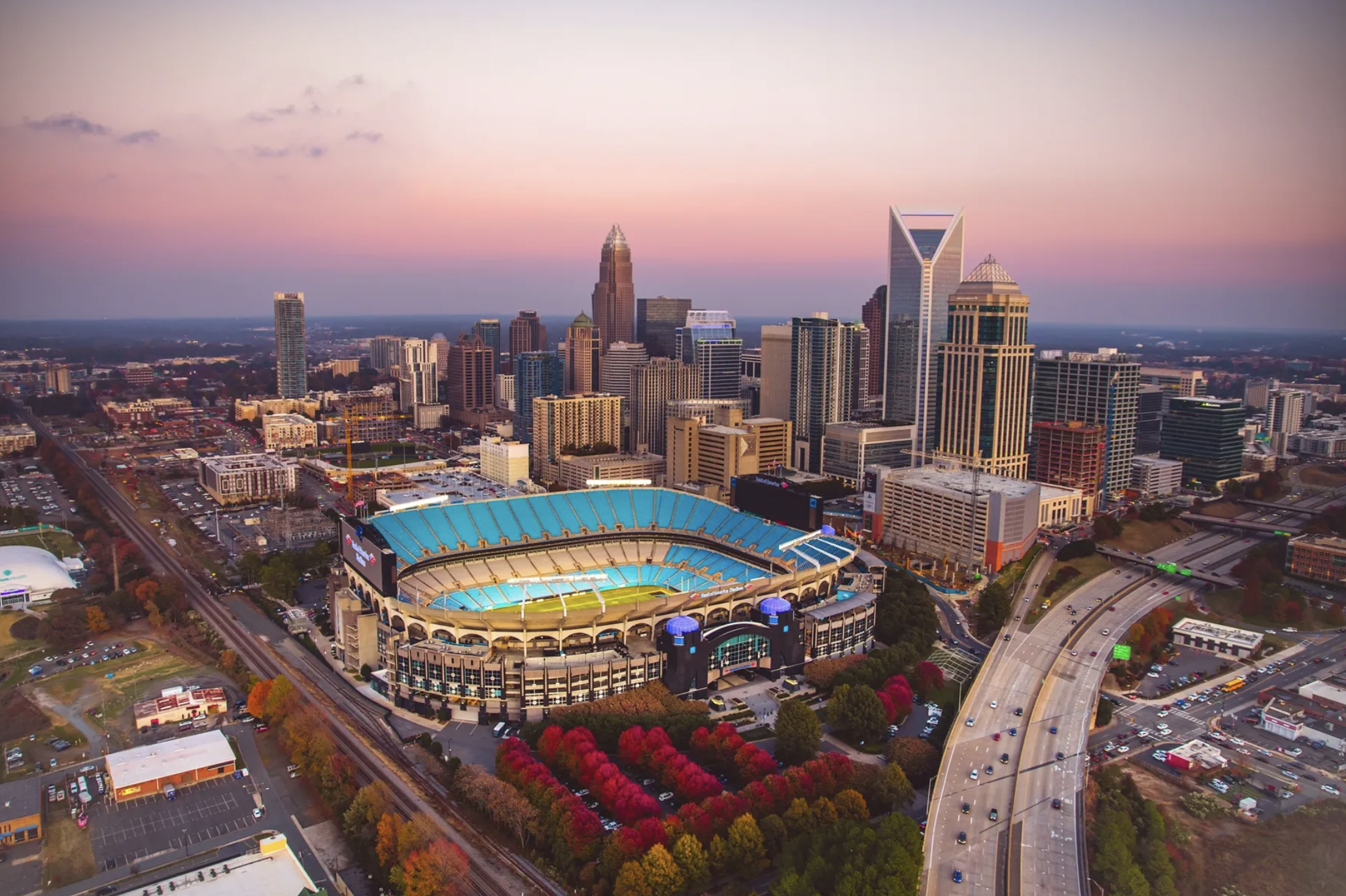Bank of America Stadium and the Uptown skyline, home of the Panthers and Charlotte FC, about 25 minutes away