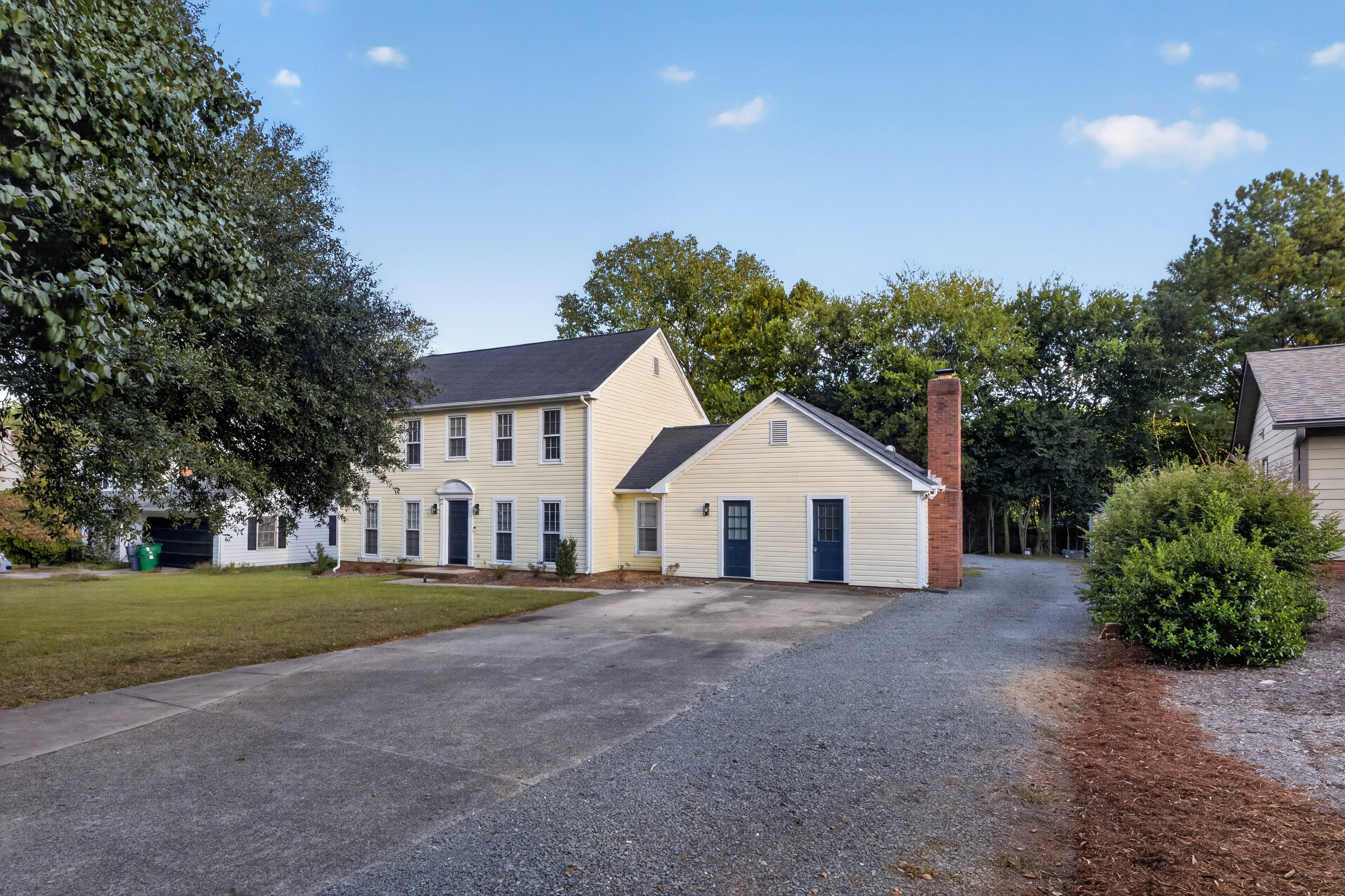 The Main House out front is a separate home. Pull past it on the shared driveway to reach the Garden House