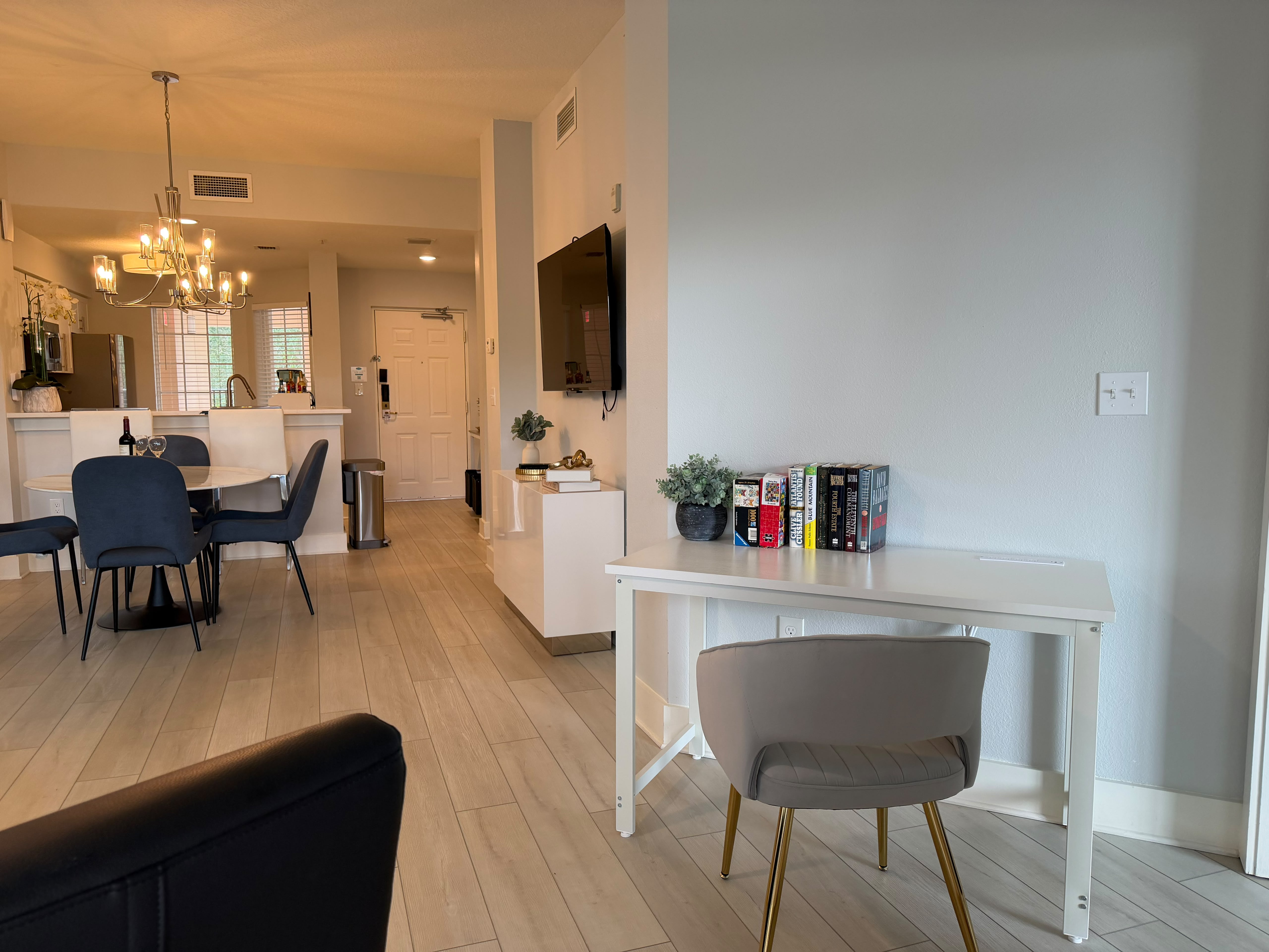 Bright open living space with dining area and dedicated work desk