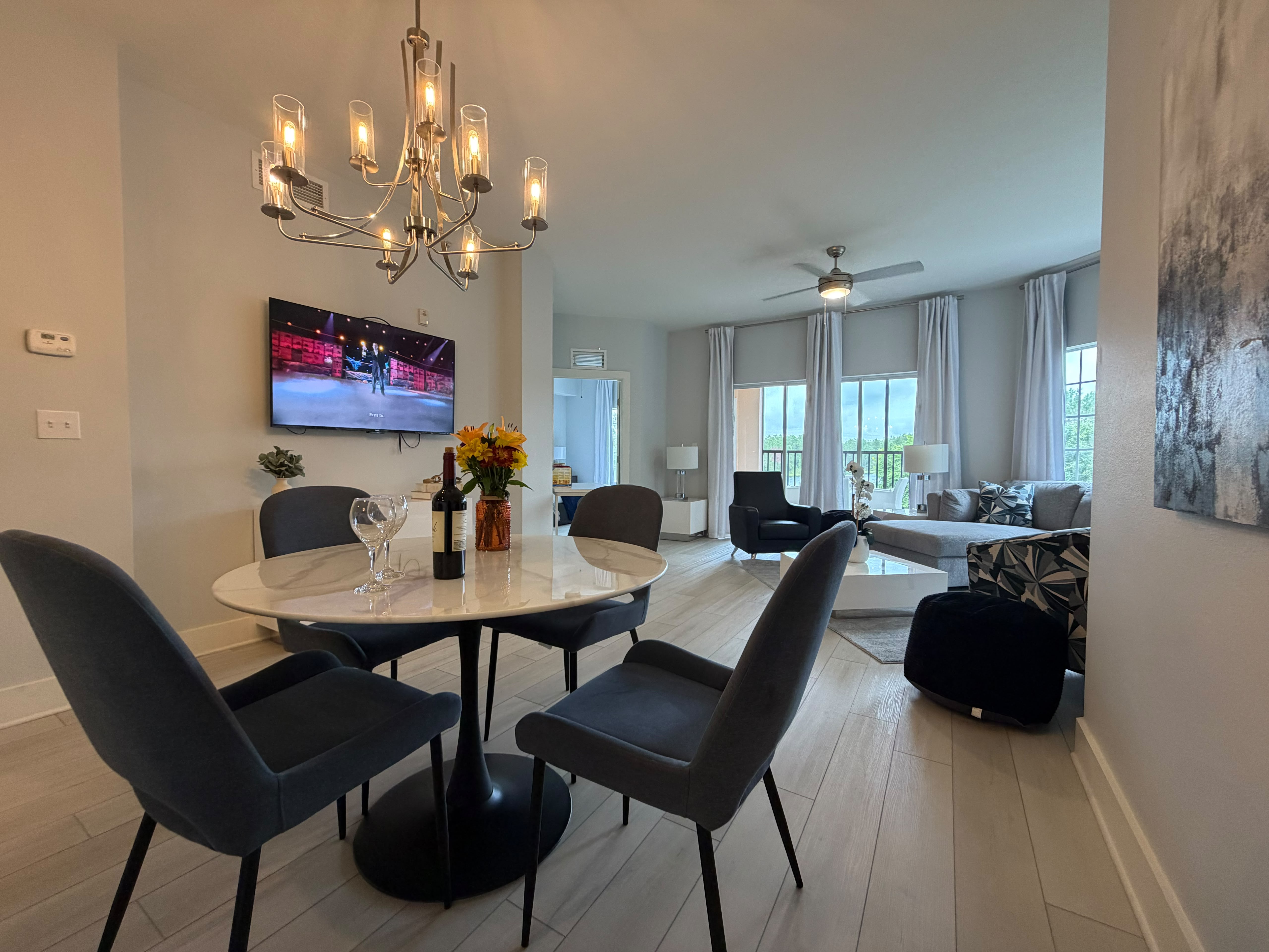 Bright open-concept living with stylish dining area and natural light