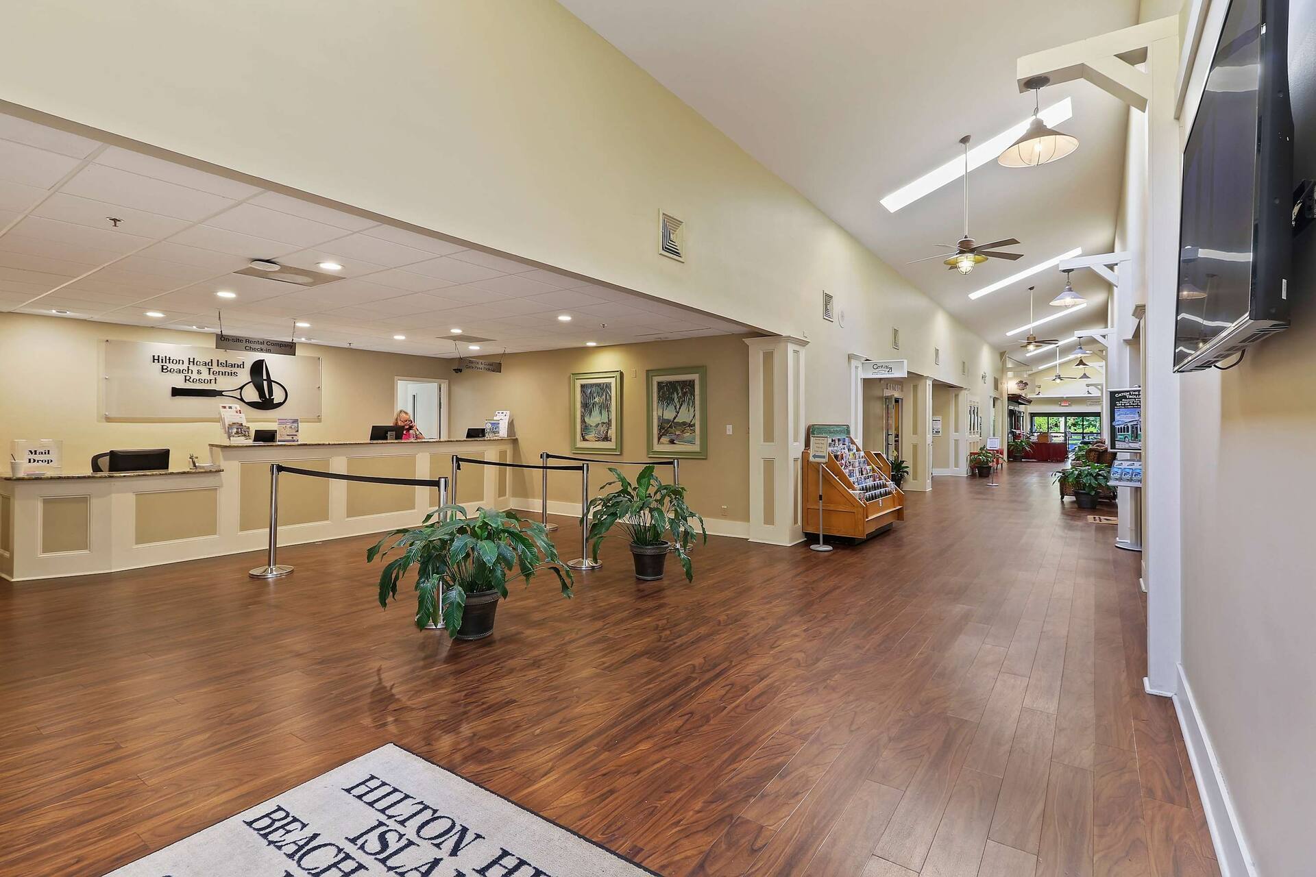 Bright, spacious lobby with warm finishes and easy front desk check-in