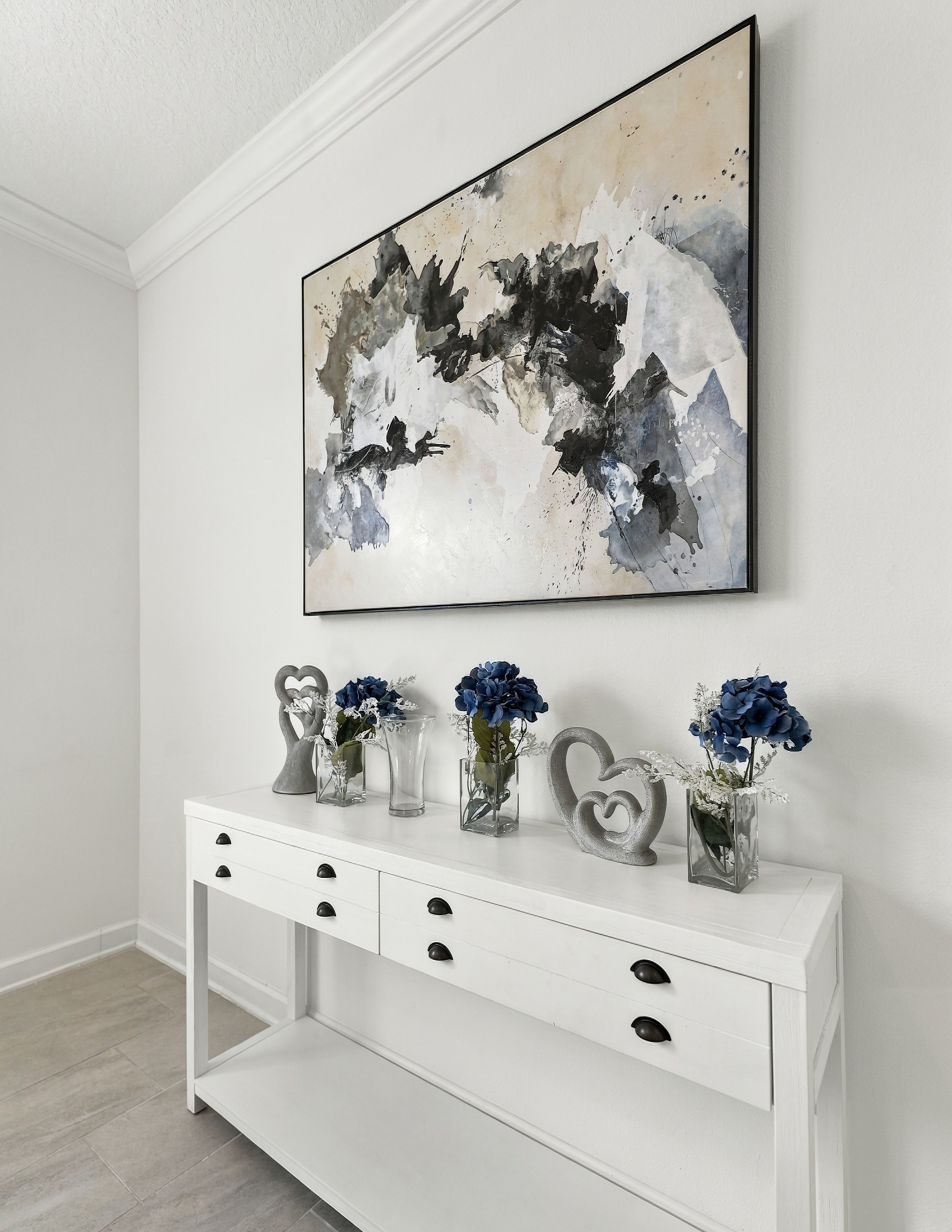 Elegant console table with abstract art and fresh modern styling