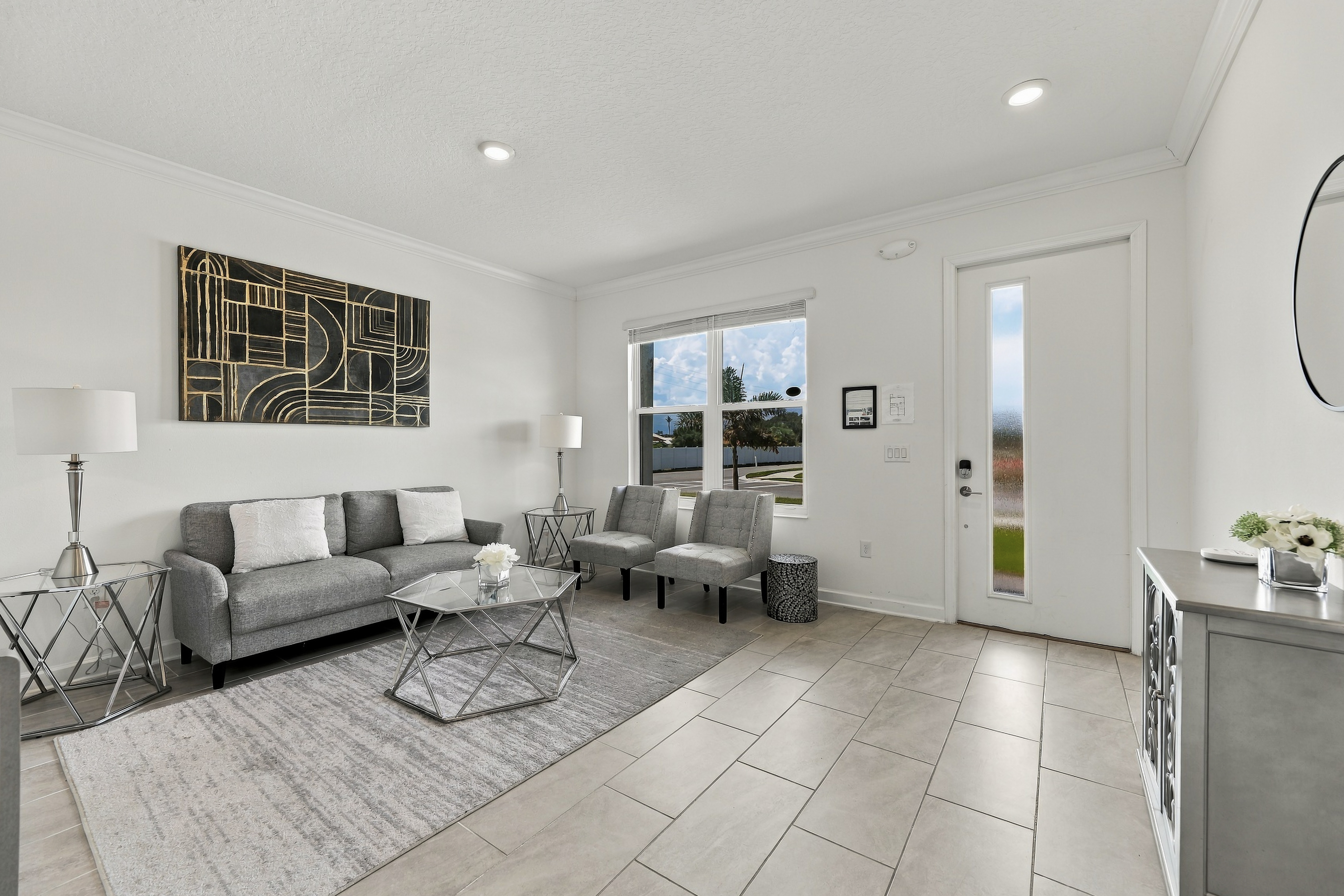 Bright modern living room with chic seating and abundant natural light