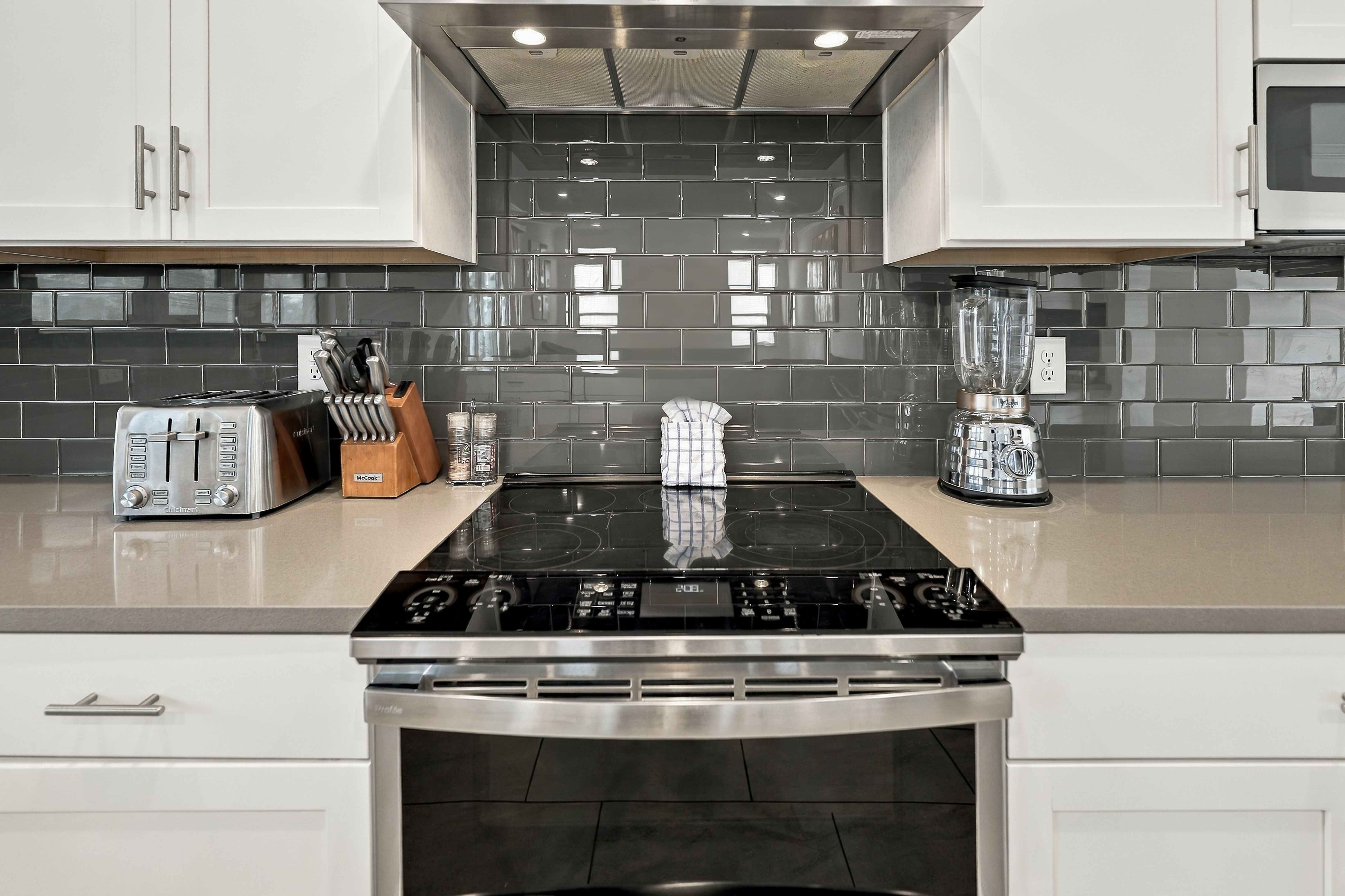Modern kitchen with sleek finishes and stainless appliances