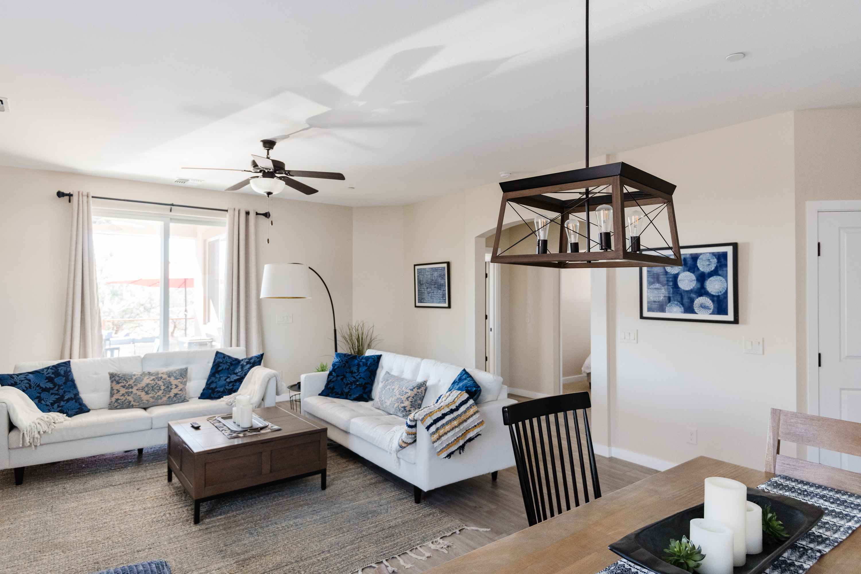 Bright open living space with cozy seating and stylish dining area