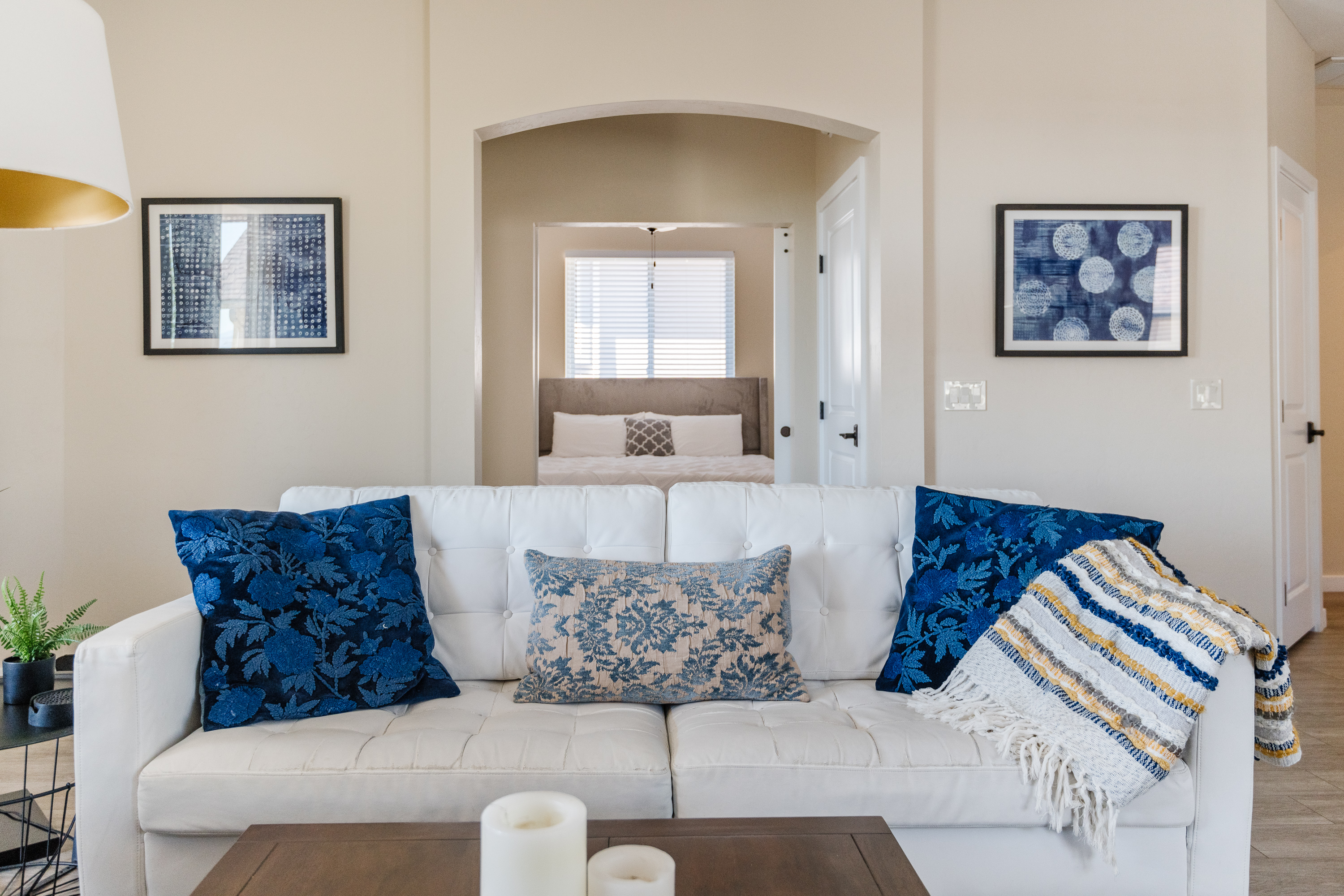 Bright modern lounge with stylish blue accents and cozy open layout
