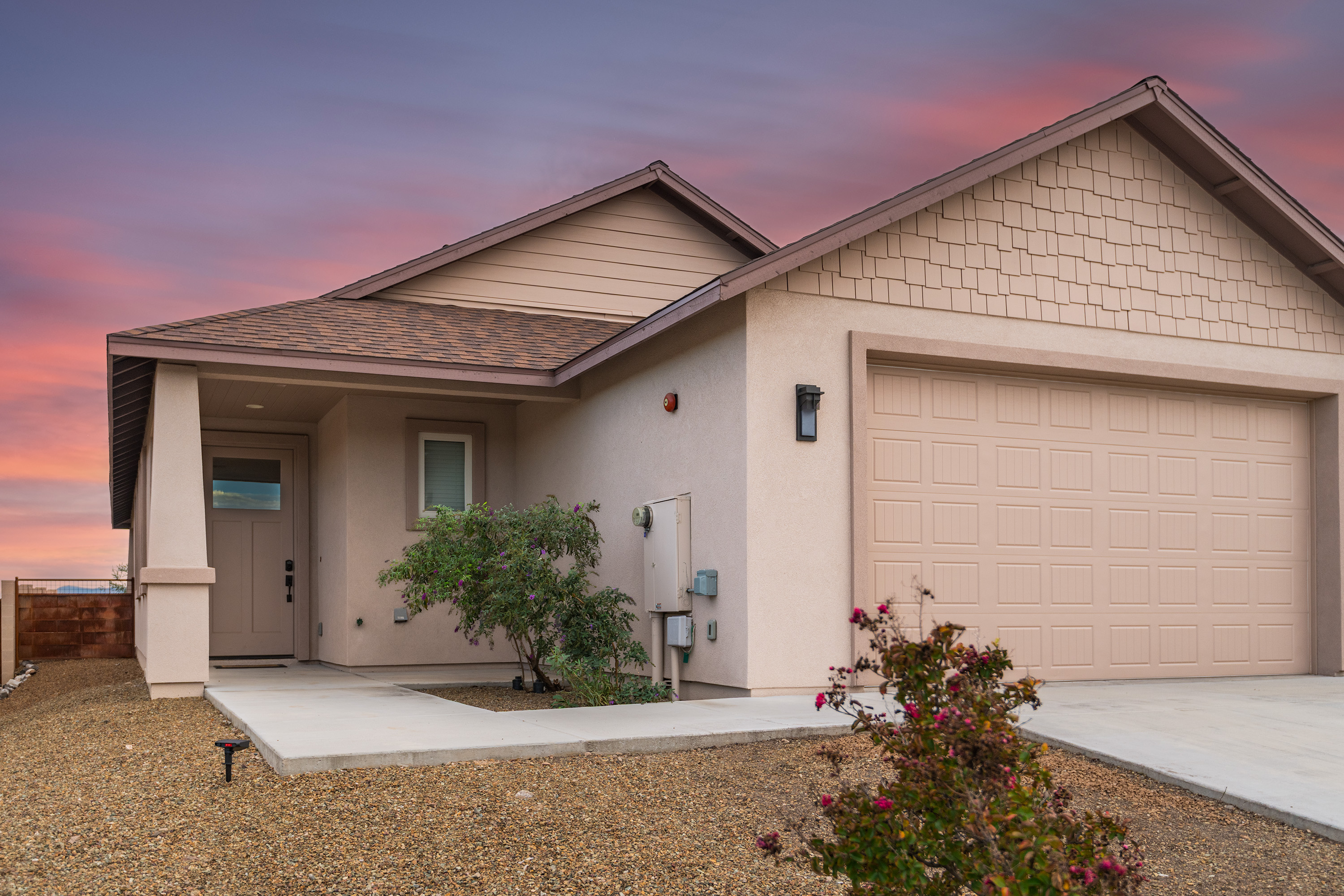 Inviting modern home with 2-car garage and welcoming covered entry