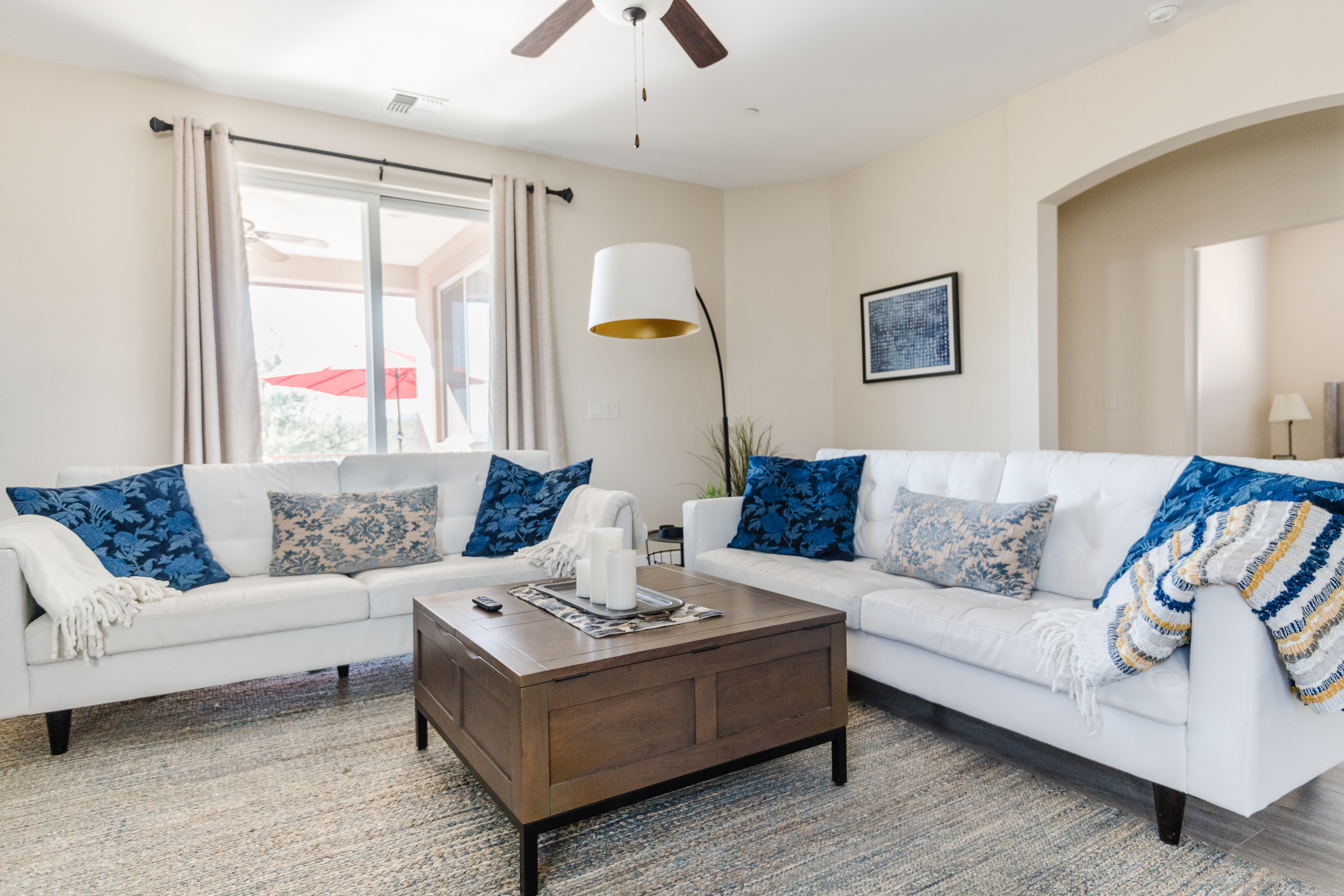 Bright, stylish living room with two sofas and abundant natural light