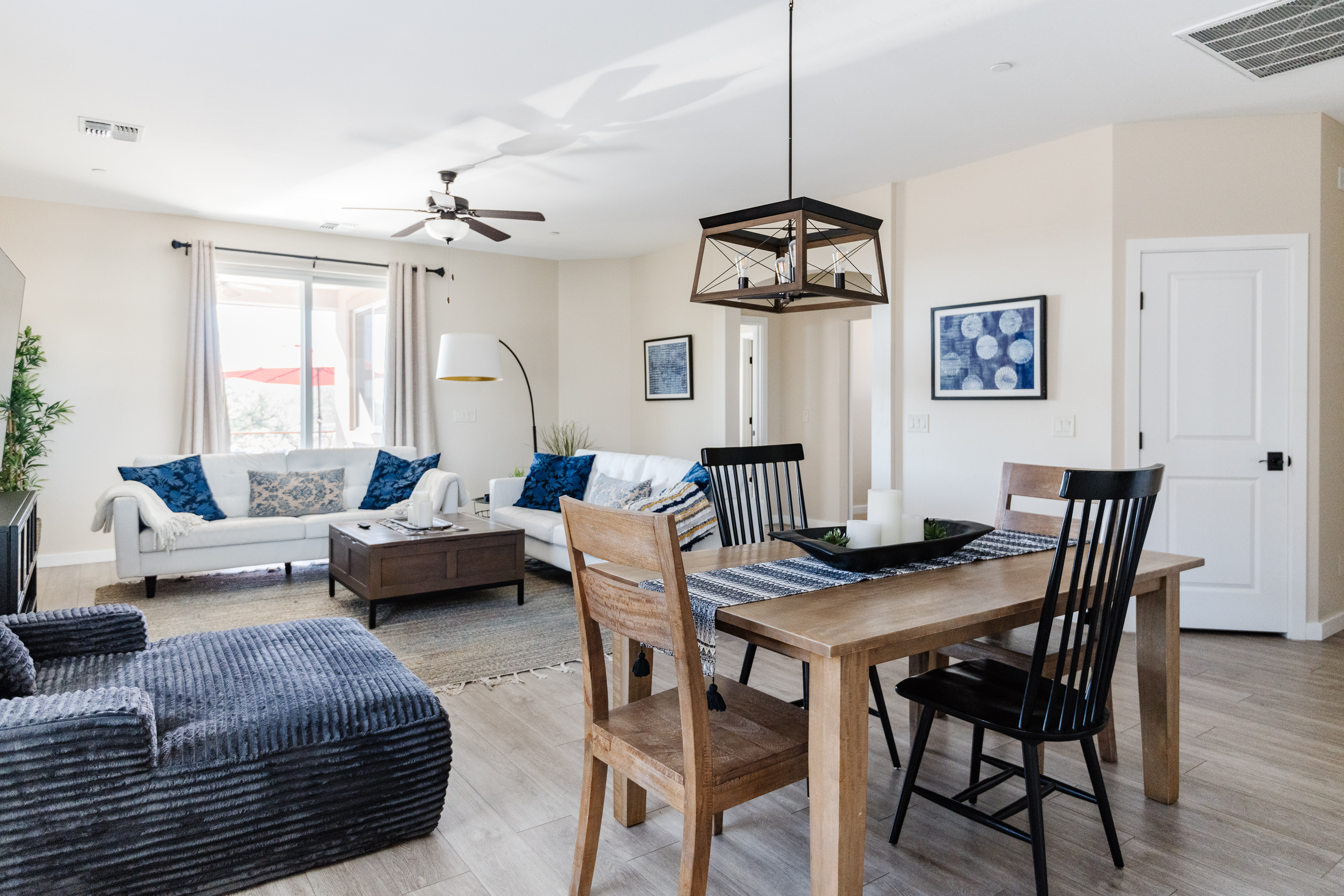 Bright open living space with stylish dining area and cozy seating