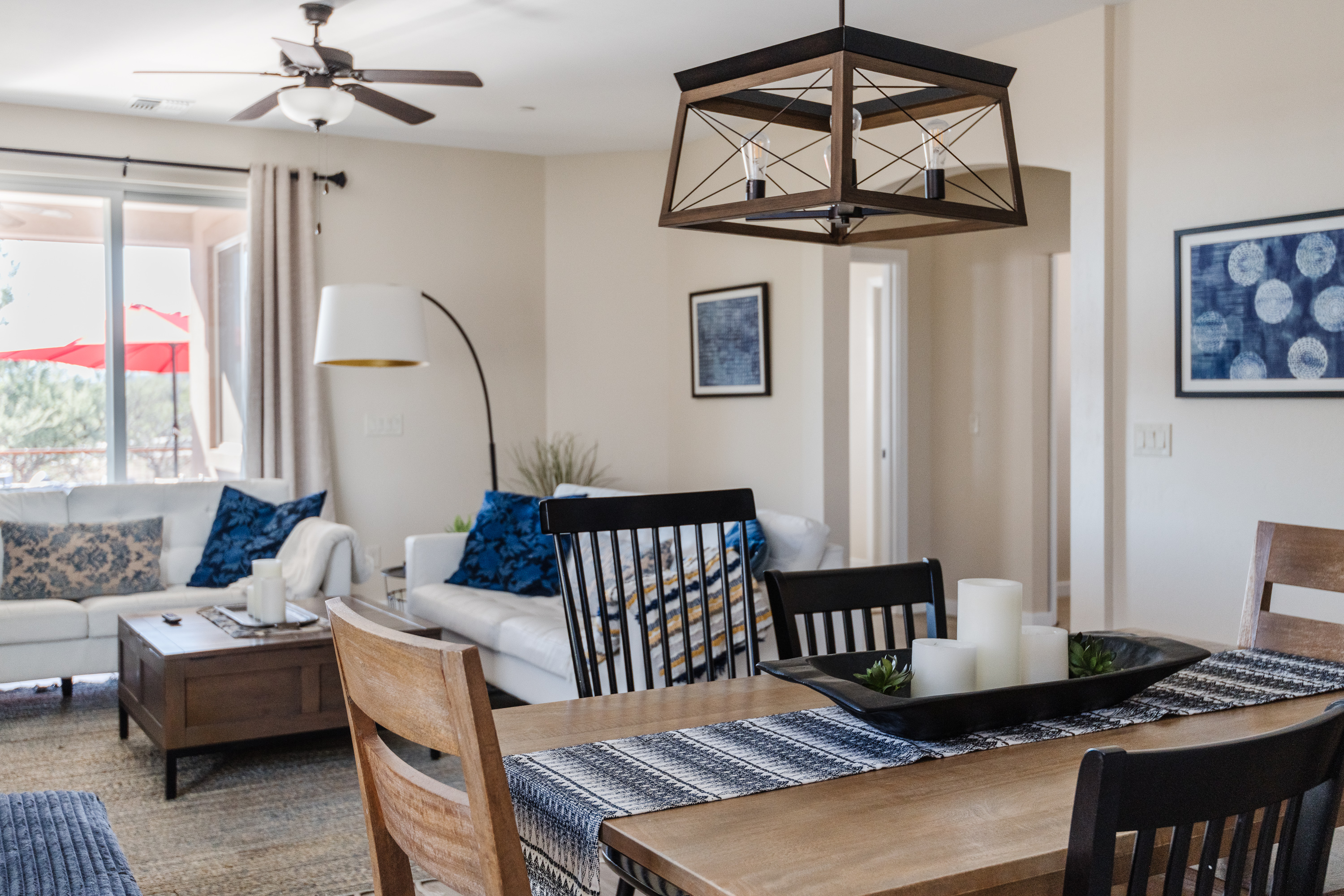 Bright open living and dining space with stylish decor and natural light