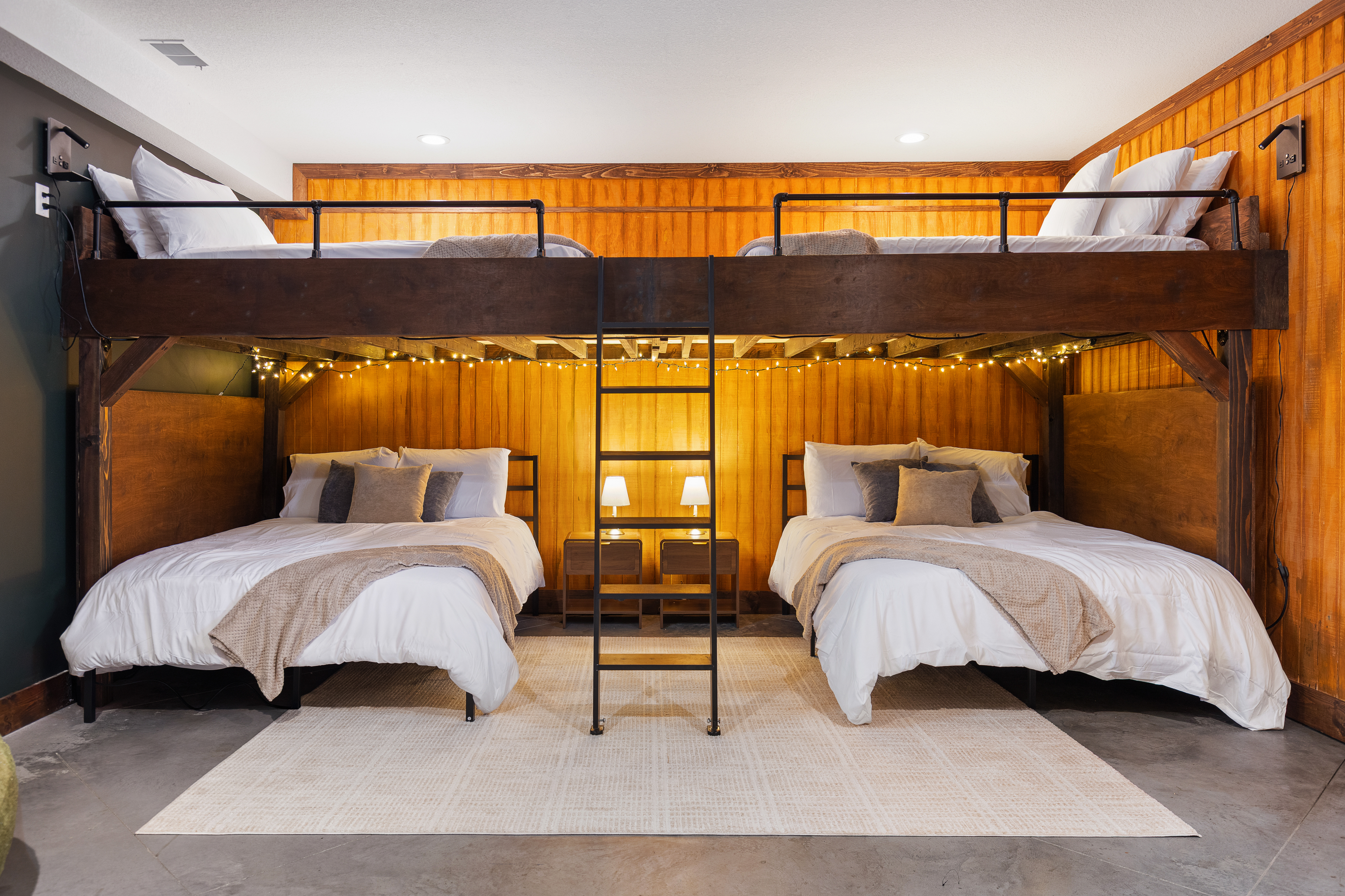 Lower level bunk room with four queen beds