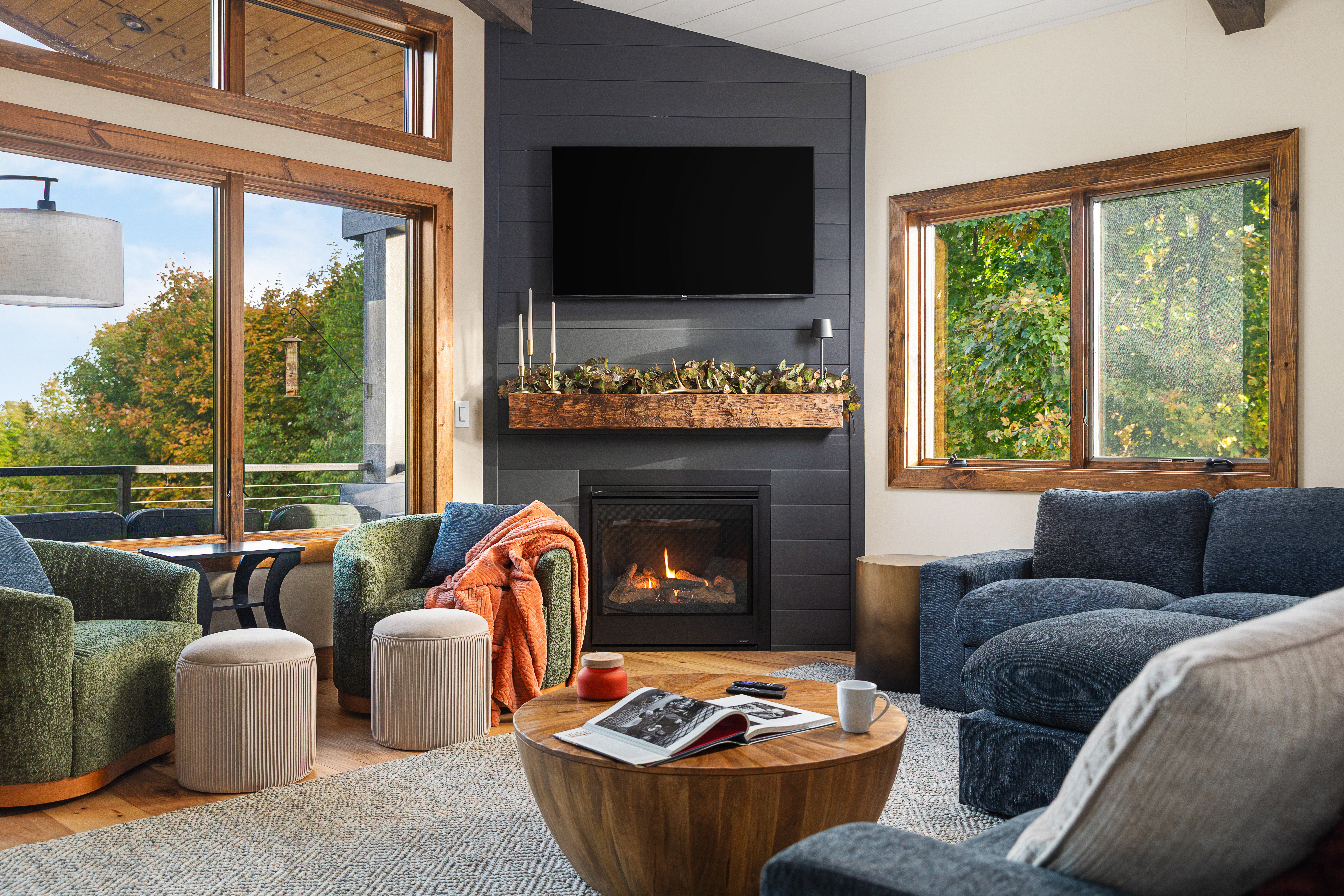 Great room fireplace corner with deep seats and big windows