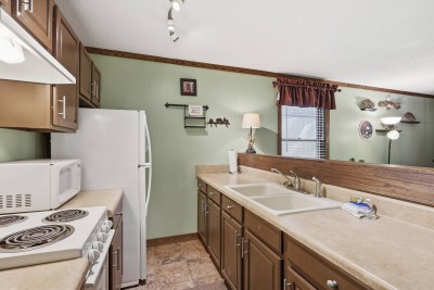 Bright, fully equipped kitchen with breakfast bar and generous counter space
