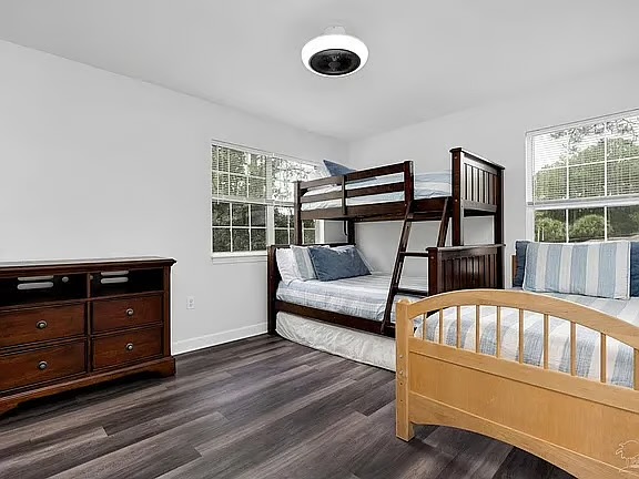 Bright family-friendly bedroom with bunk beds and natural light