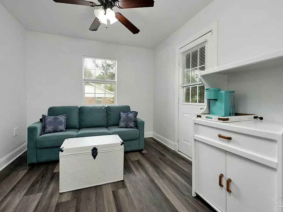 Cozy lounge nook with coffee station and bright modern finishes