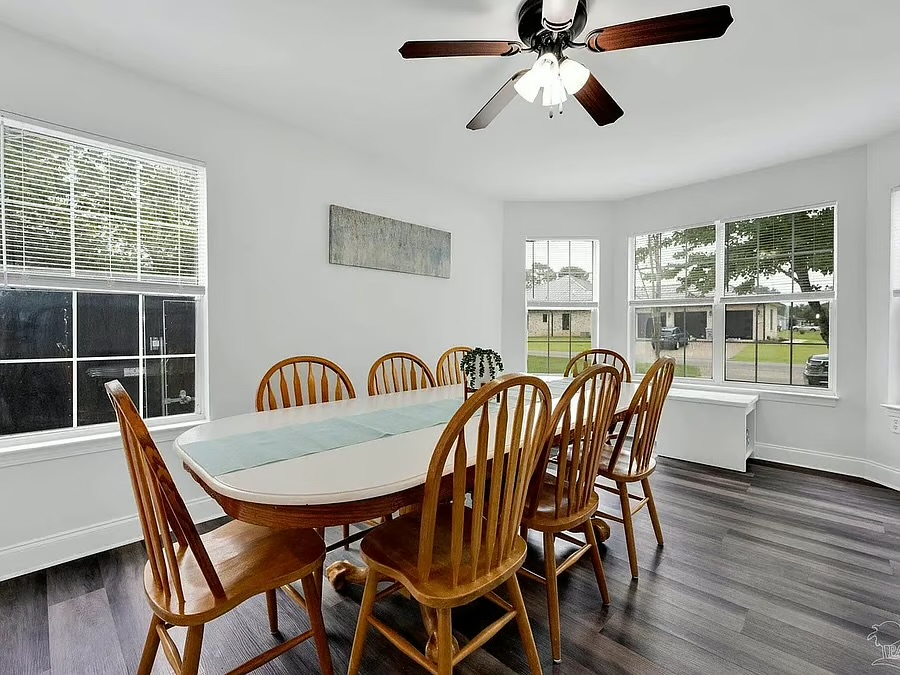 Bright dining room with seating for 8 and beautiful natural light