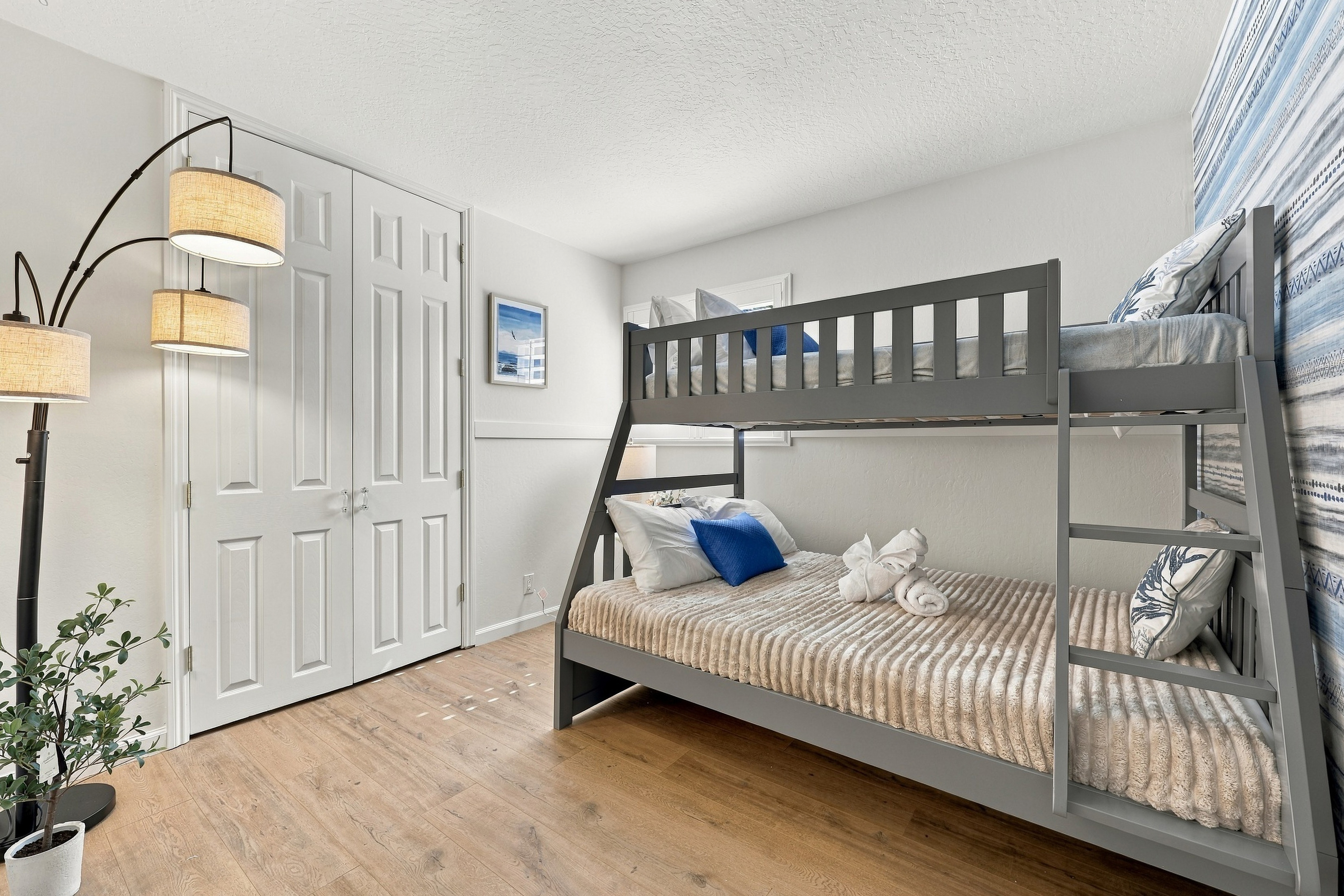 Bright bunk room with stylish décor and extra sleeping space