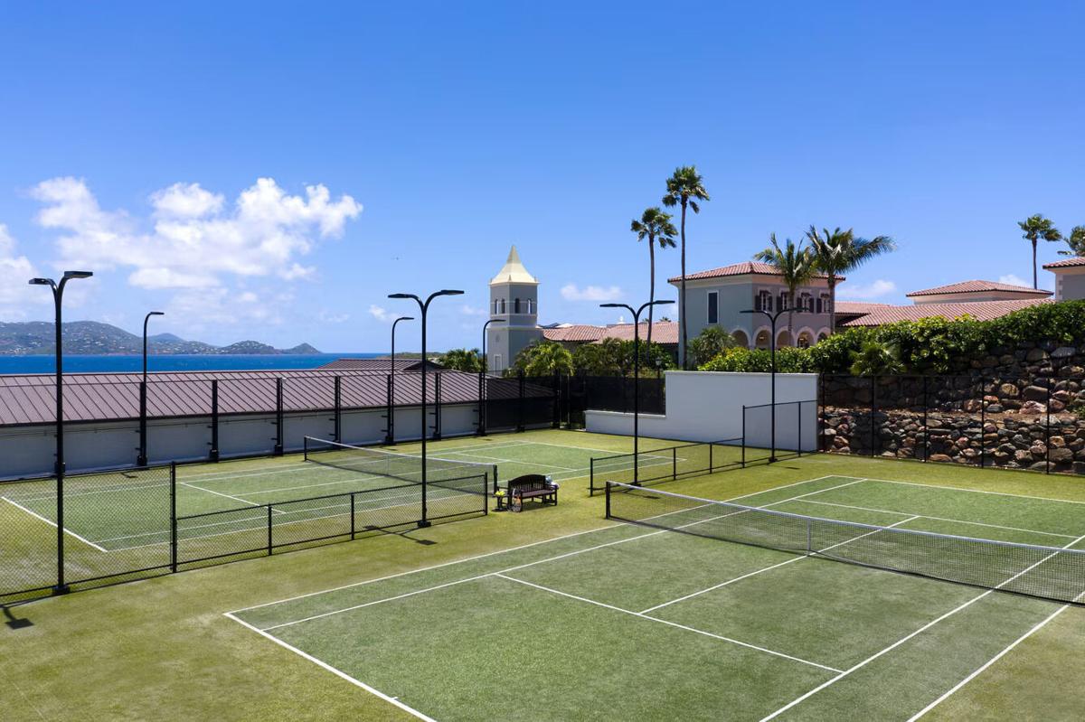 Private tennis courts with ocean views and a resort-style setting