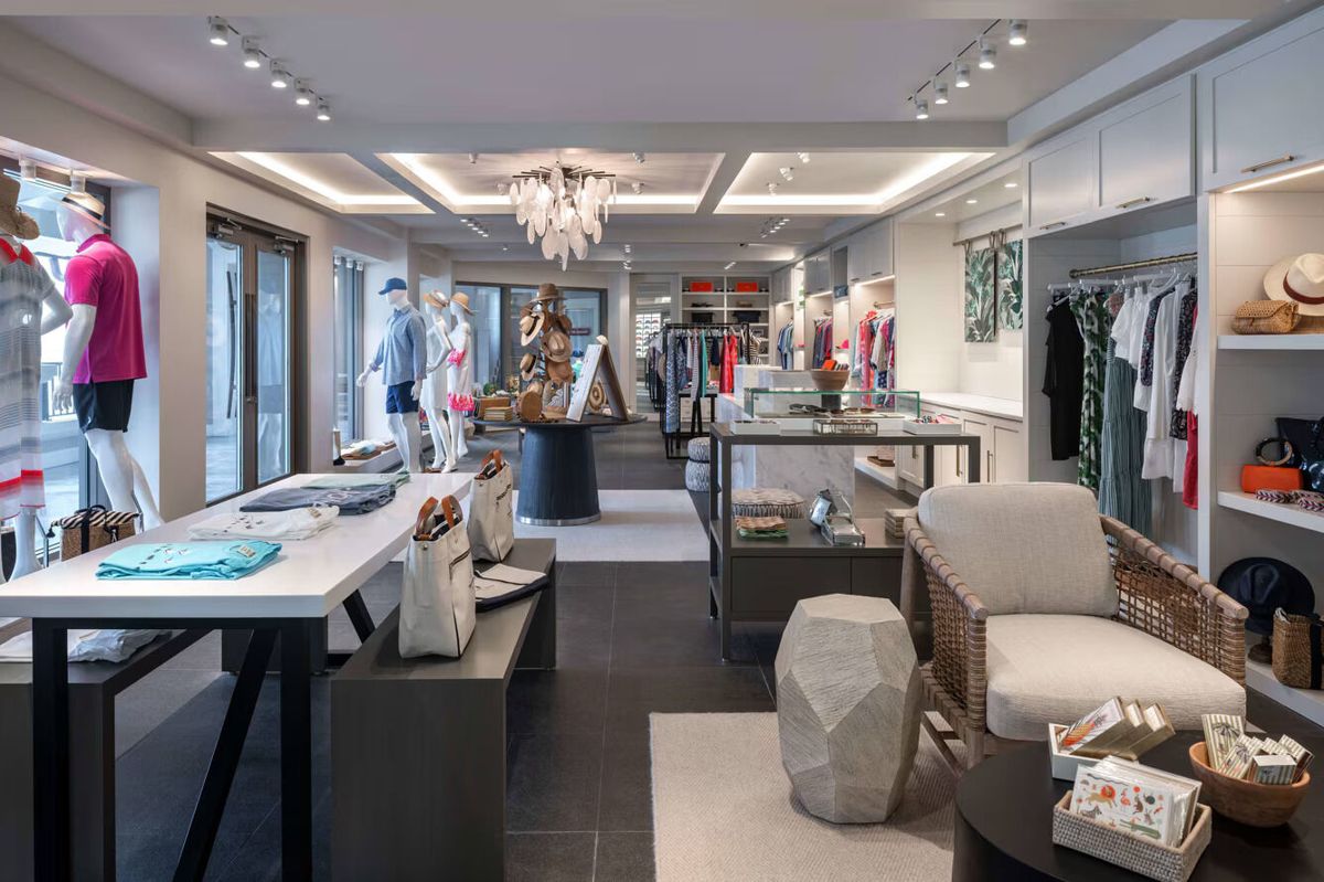 Bright, upscale boutique with elegant displays and a welcoming feel