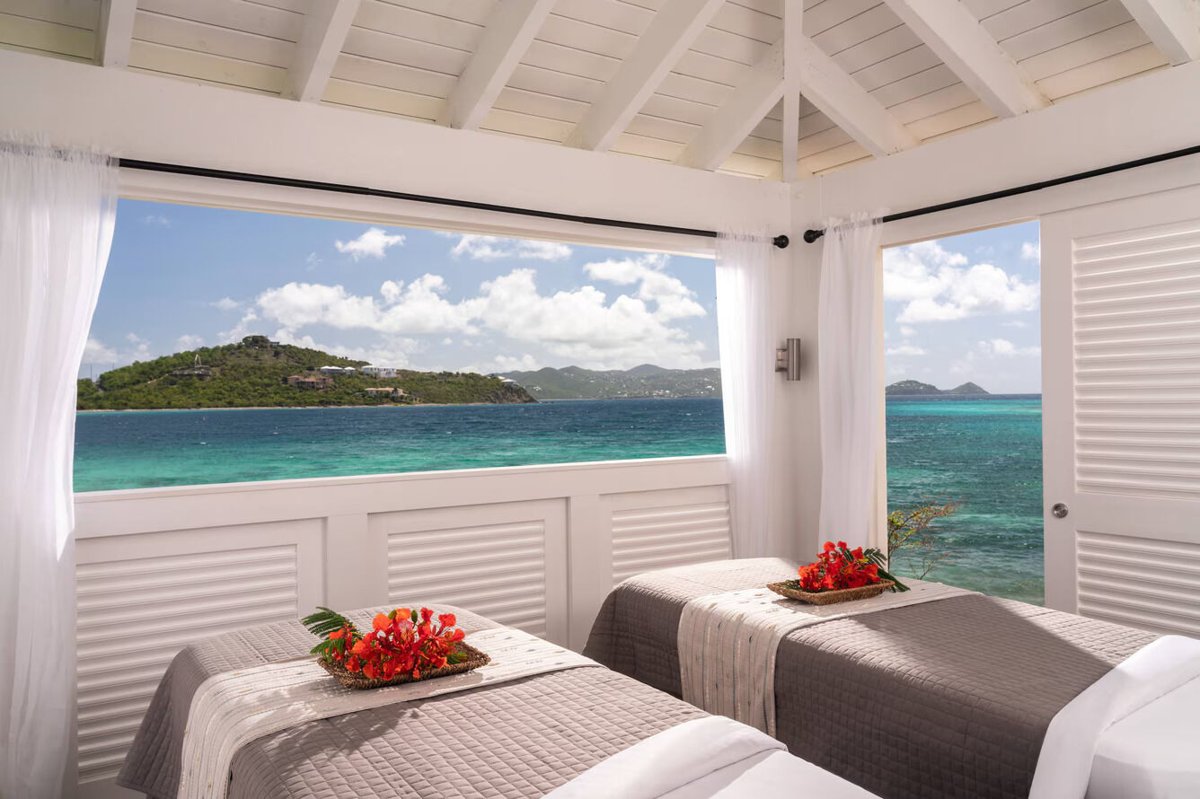Wake up to breathtaking turquoise ocean views from this airy coastal bedroom