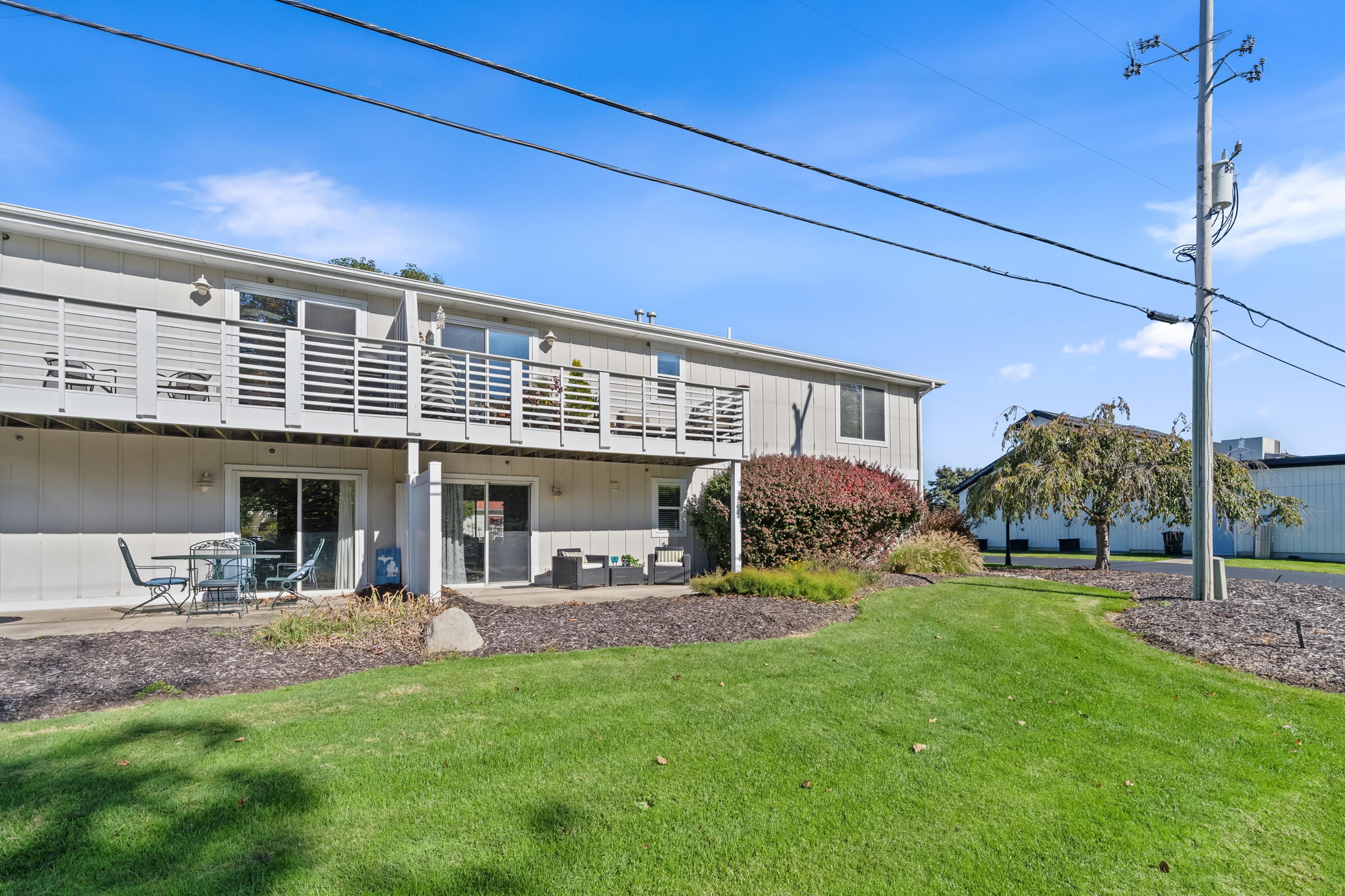 Spacious lawn, private patio, and balcony at this inviting getaway