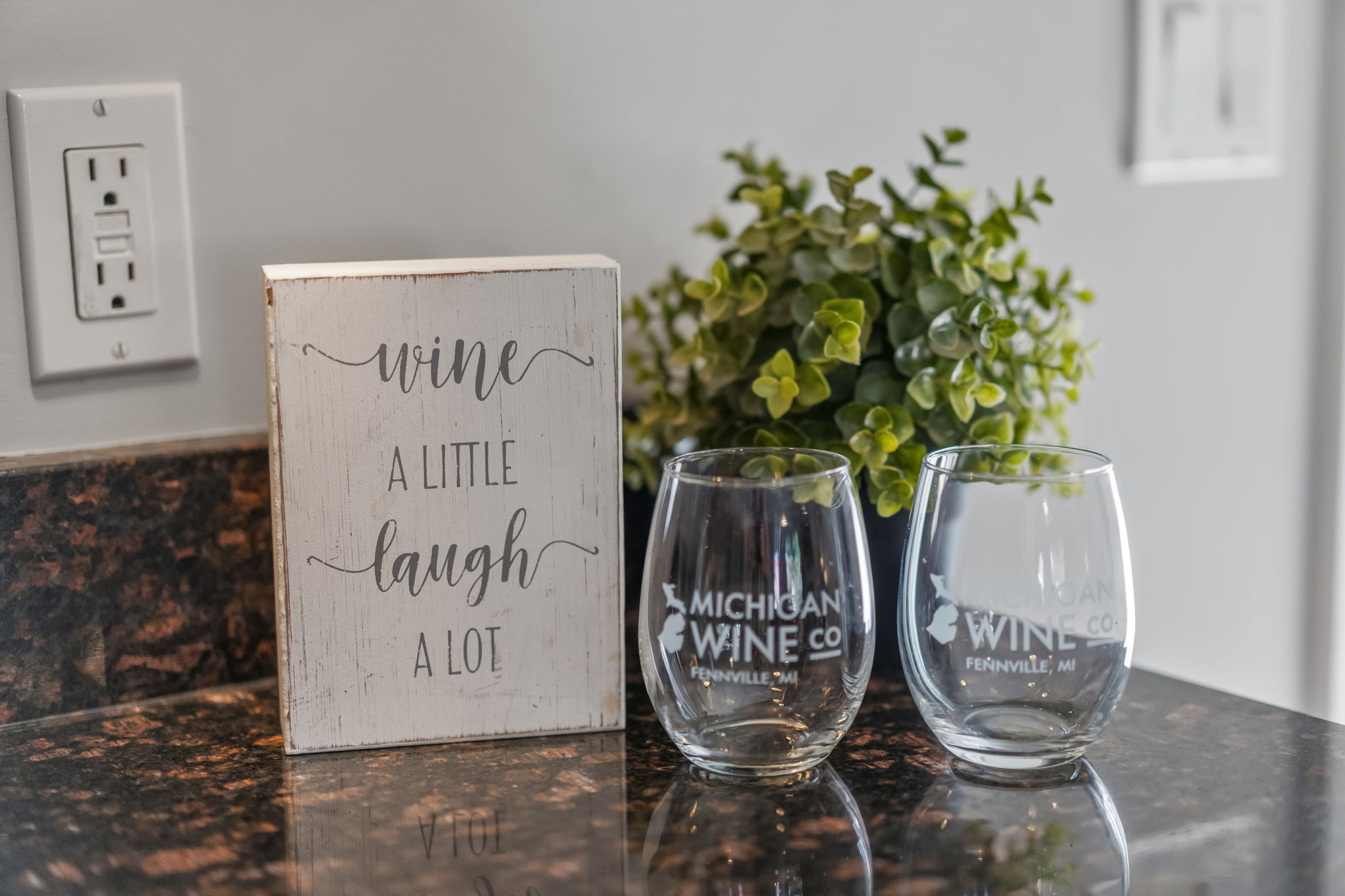 Charming wine nook with local touches and cozy countertop decor