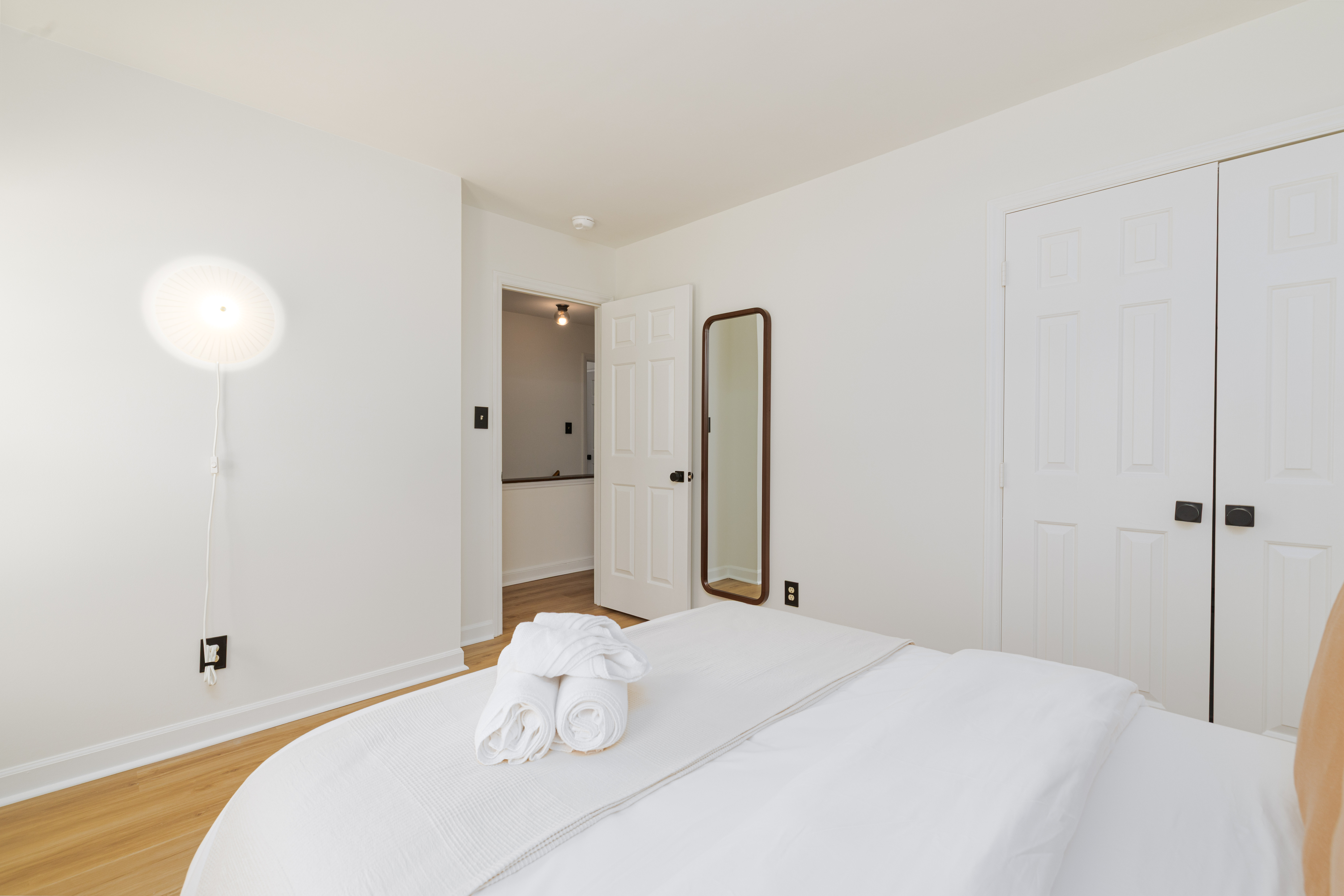 Bedroom 2: queen bed, double-door closet and full-length mirror