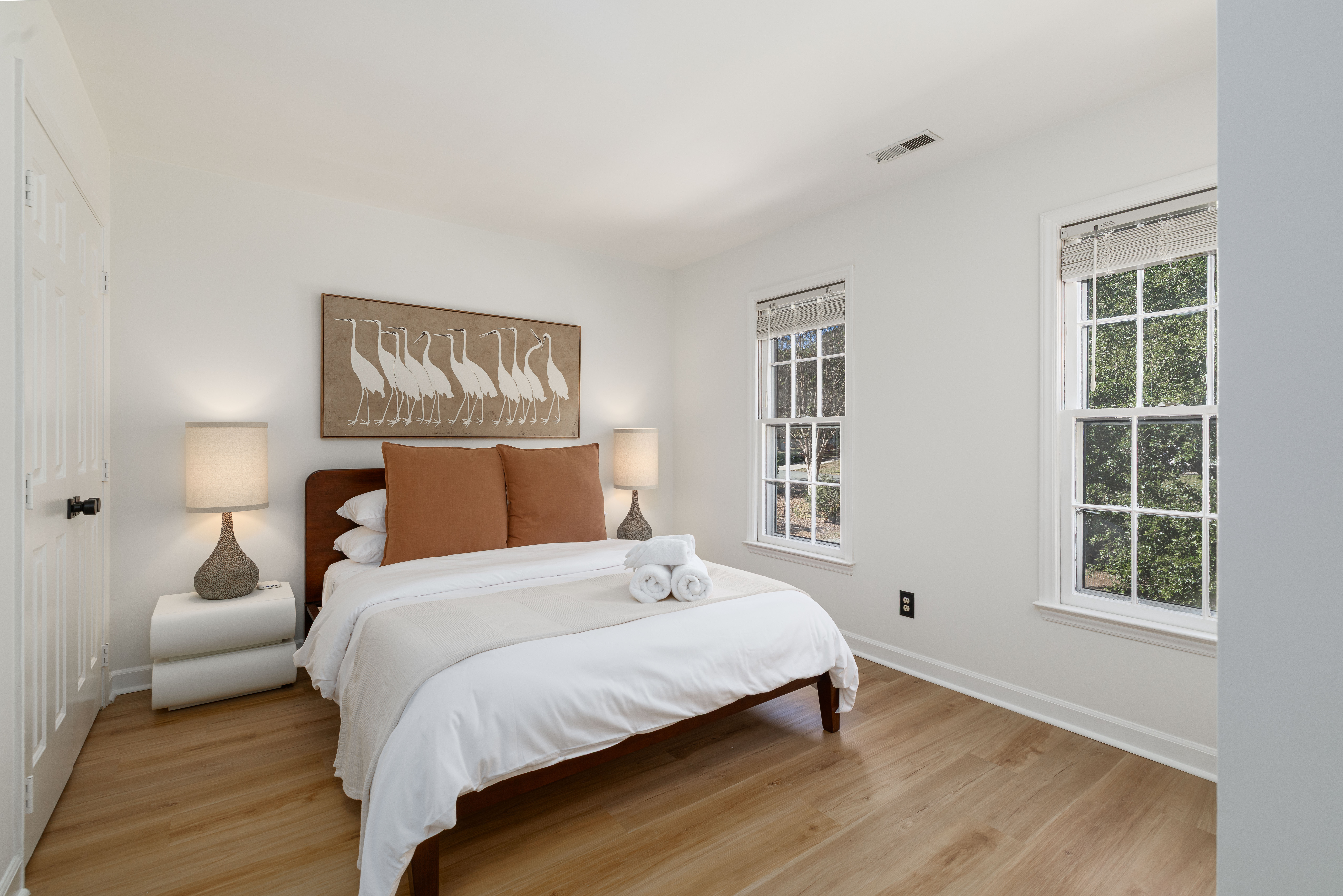 Bedroom 3: queen bed with two nightstands and lamps