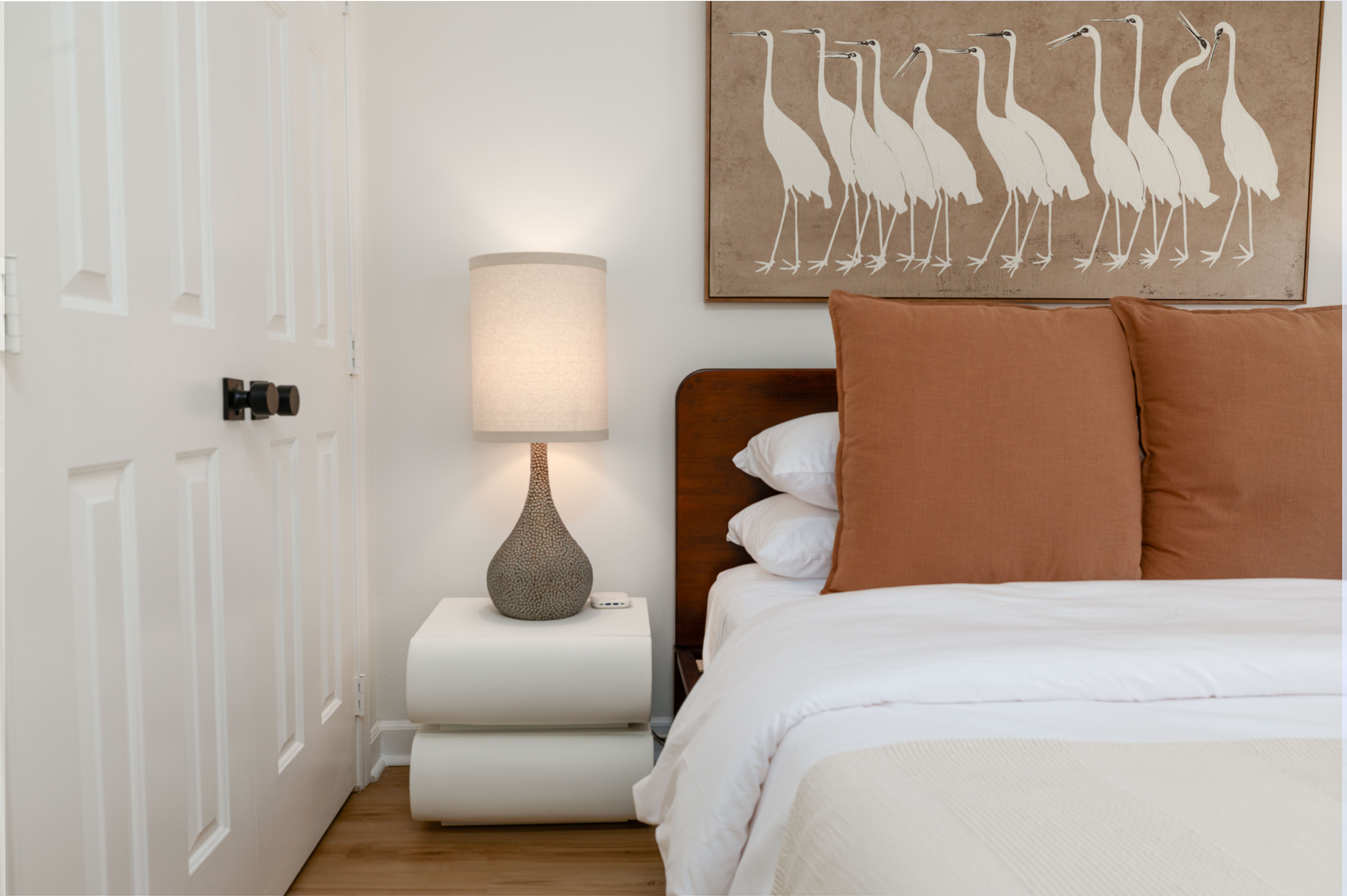 Bedroom 3: queen bed with a bedside lamp
