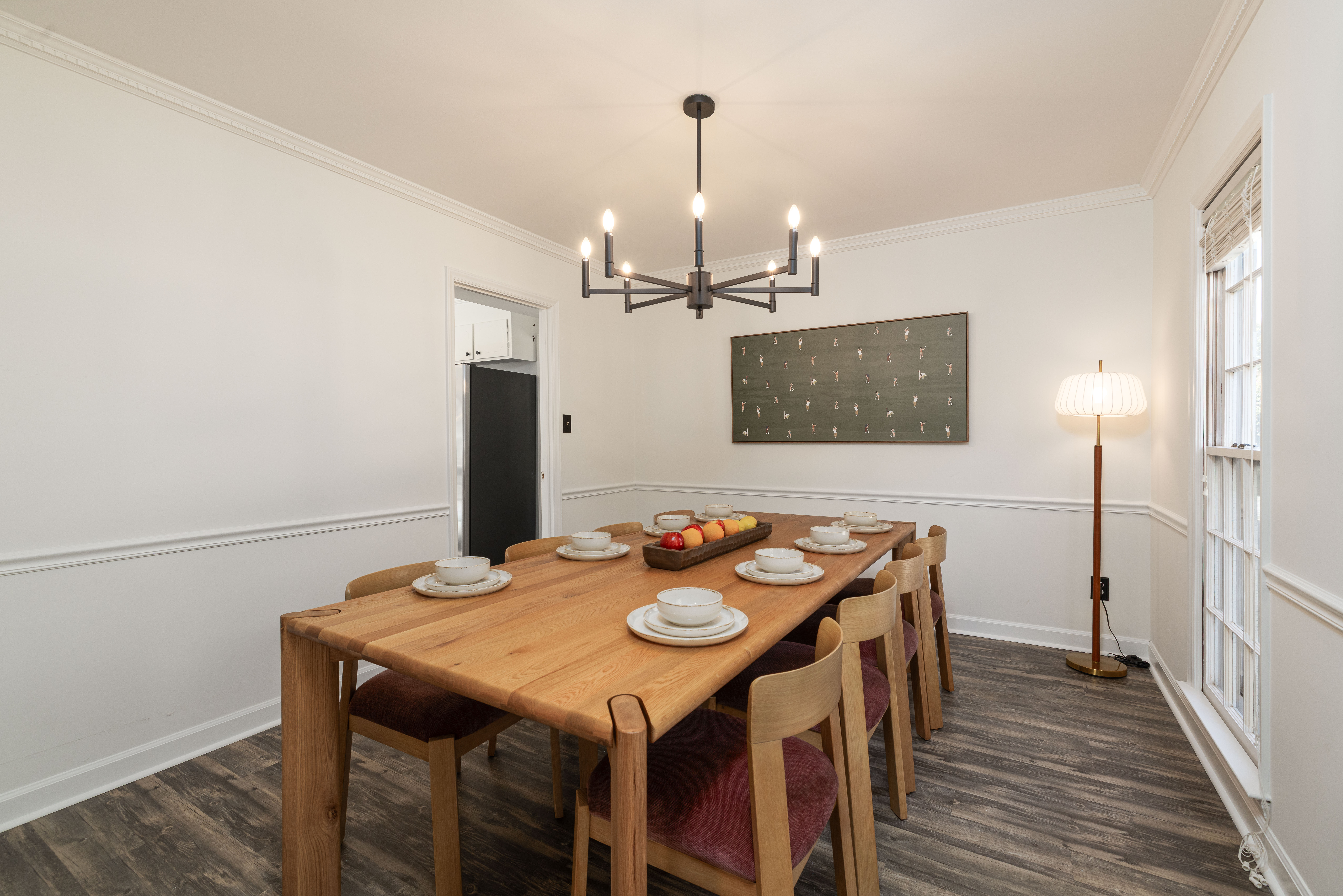 Dining room with a 96-inch oak table that seats 8
