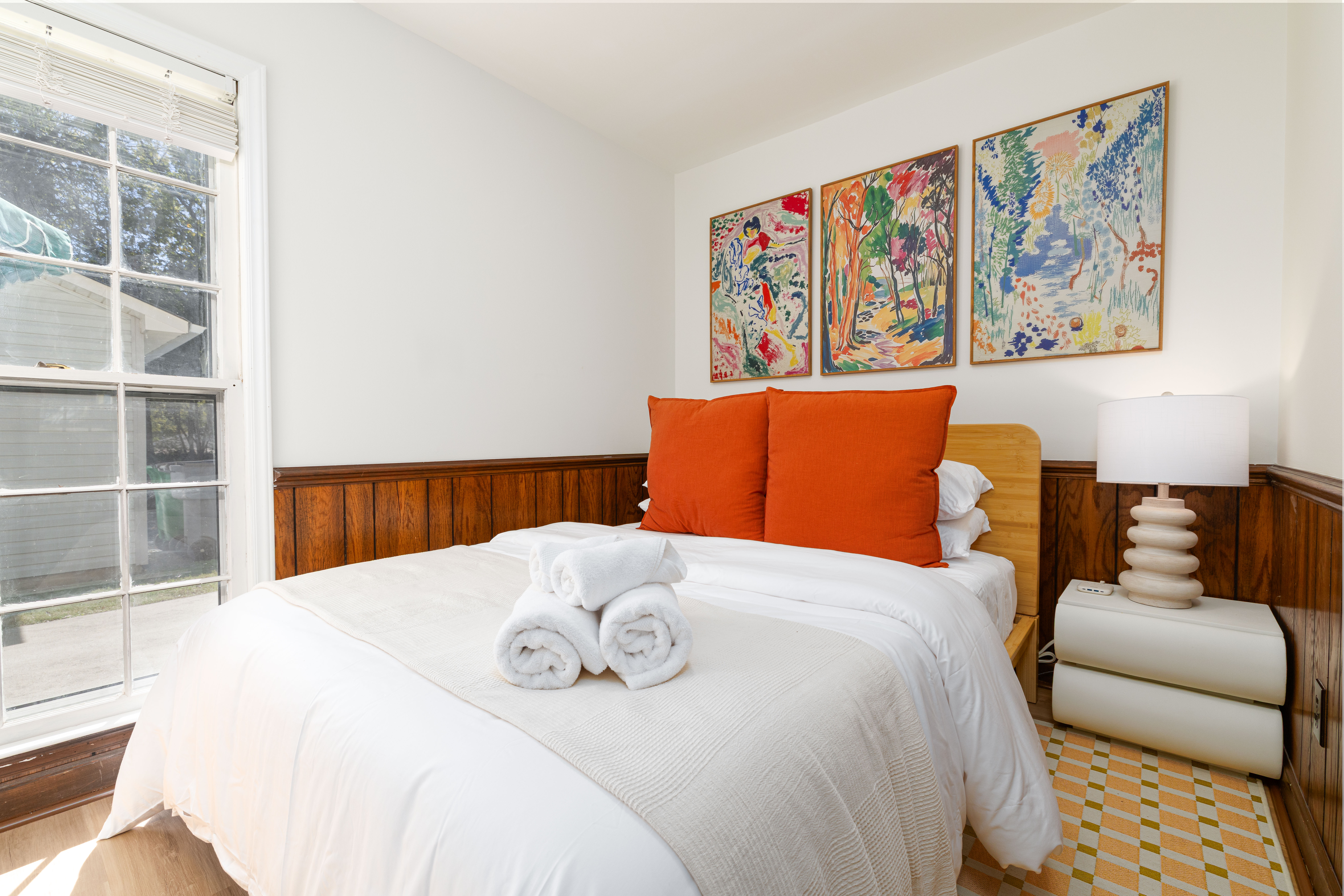 Bedroom 4 (downstairs): queen bed with a runner rug