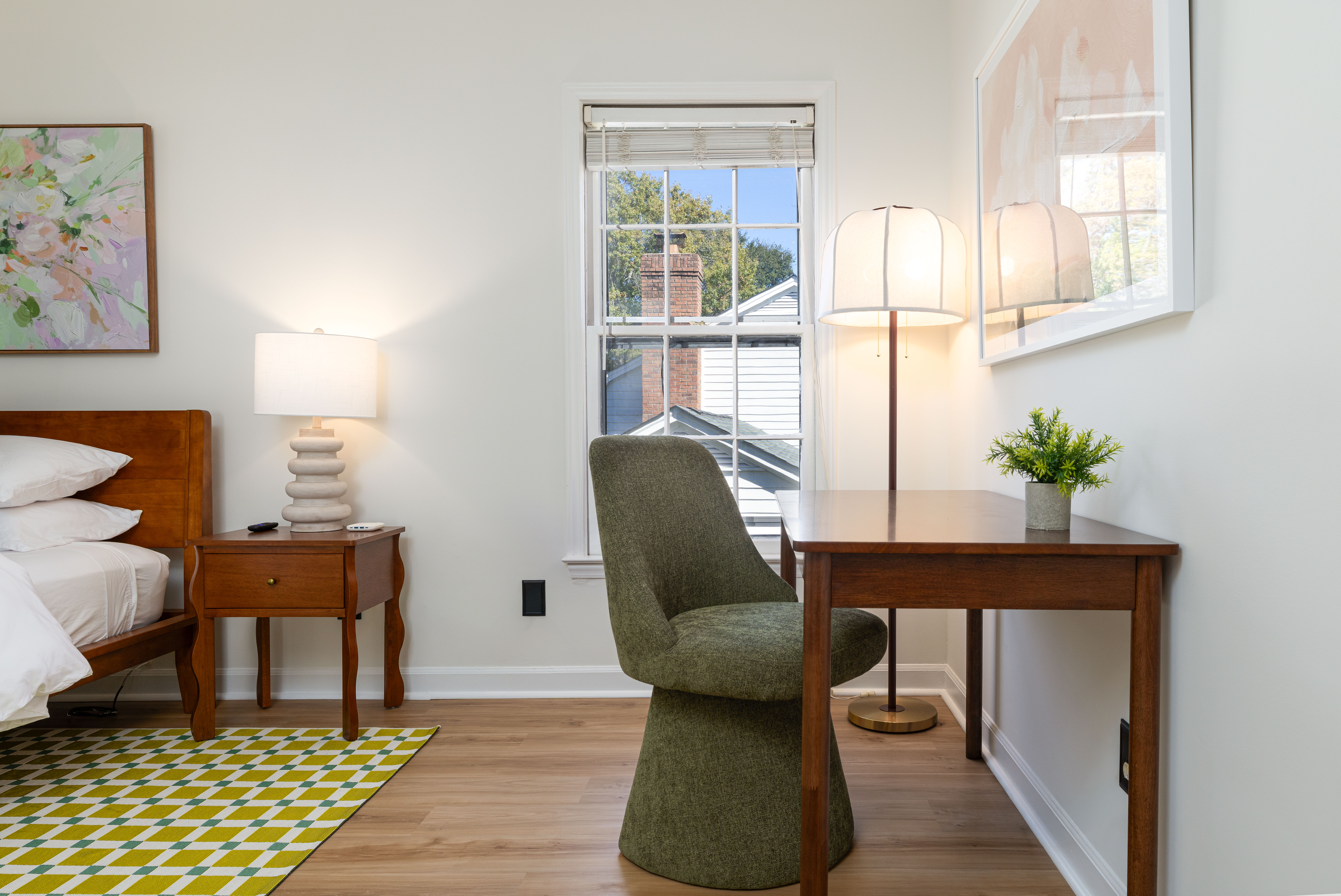 Primary suite desk by the window, for anyone who has to log on