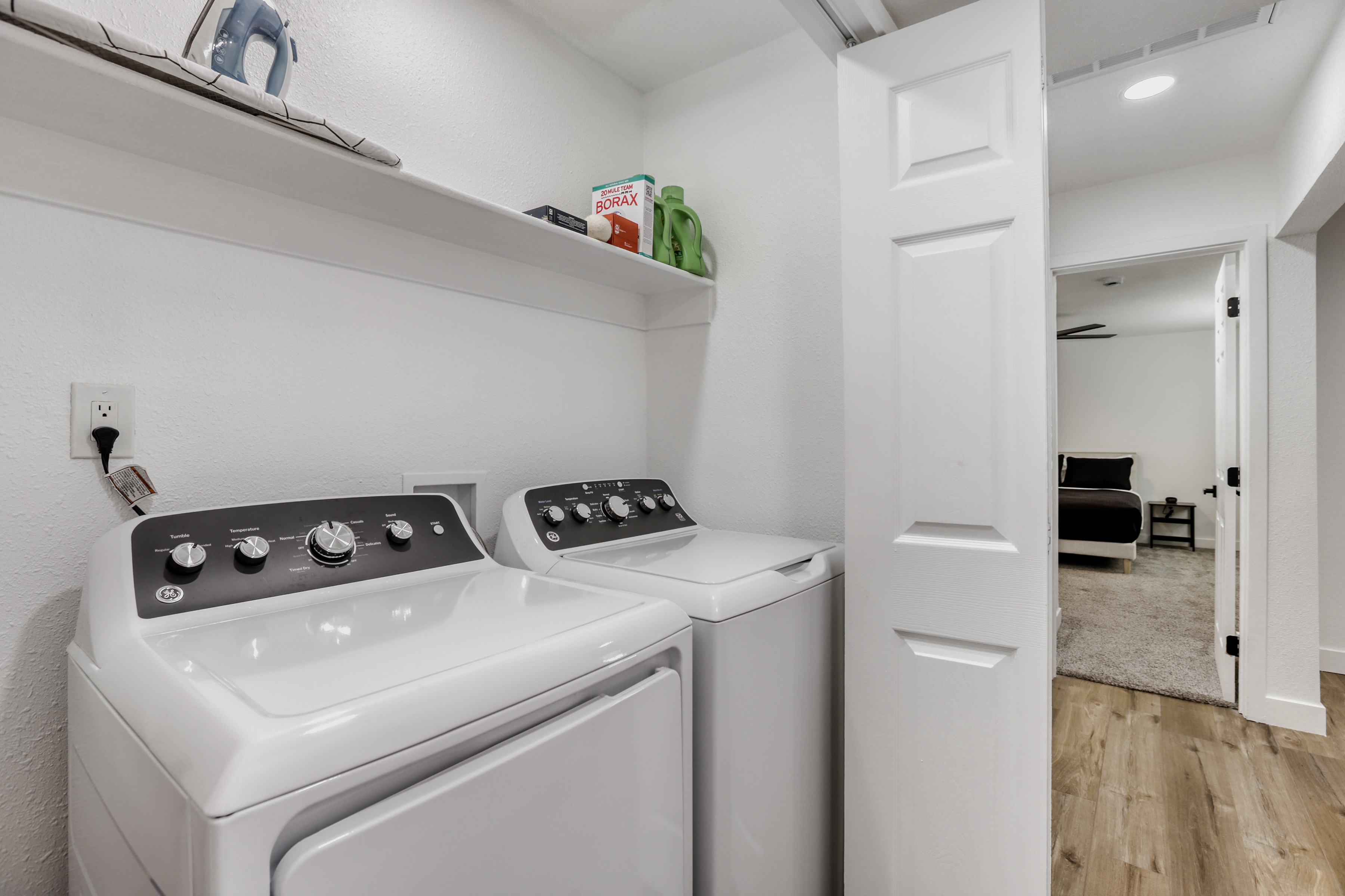 Convenient in-home washer and dryer with handy storage shelf