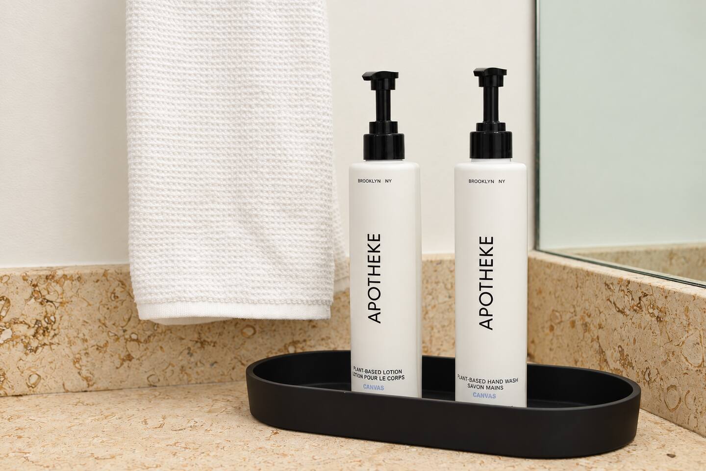 Apotheke hand soap and body lotion provided in every bathroom