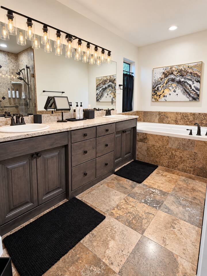 Primary Suite (Main Level) Bathroom with Double Vanity, Jacuzzi Tub and Walk-In Shower