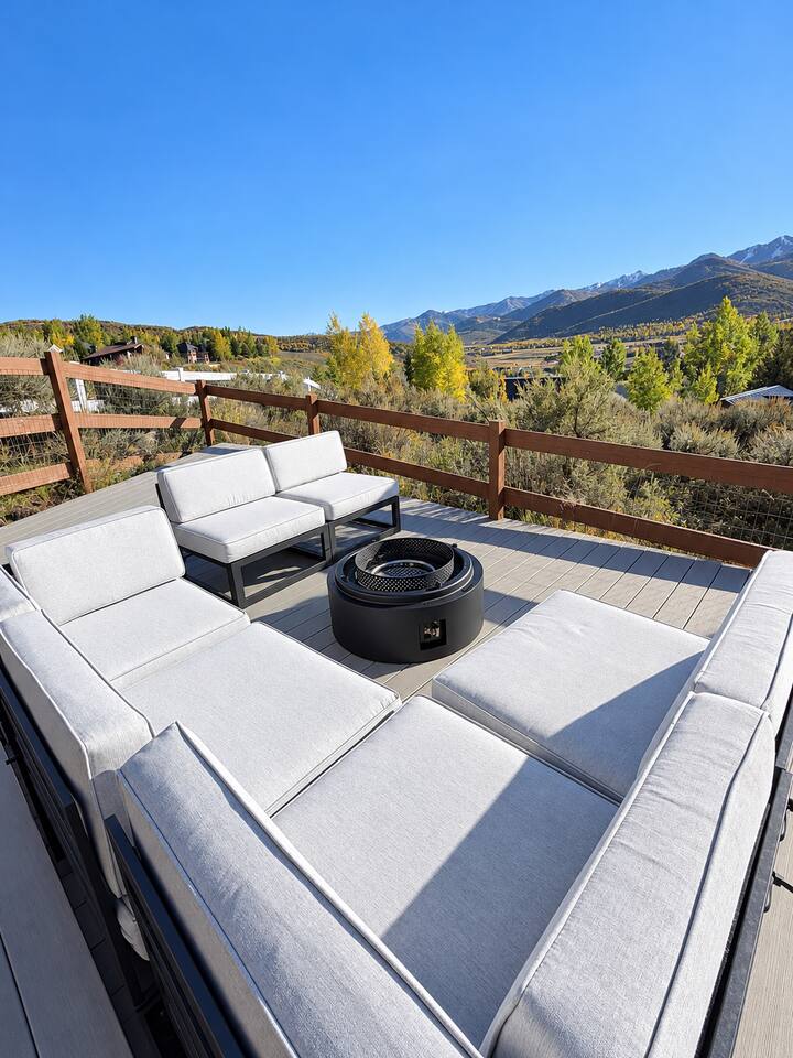 Backyard seating area with natural gas fire pit