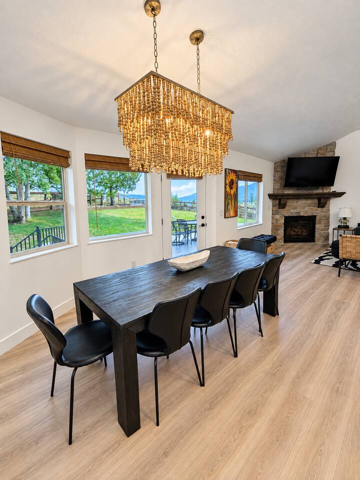 Dining table with seating for 10 (6 dining chairs and a bench).