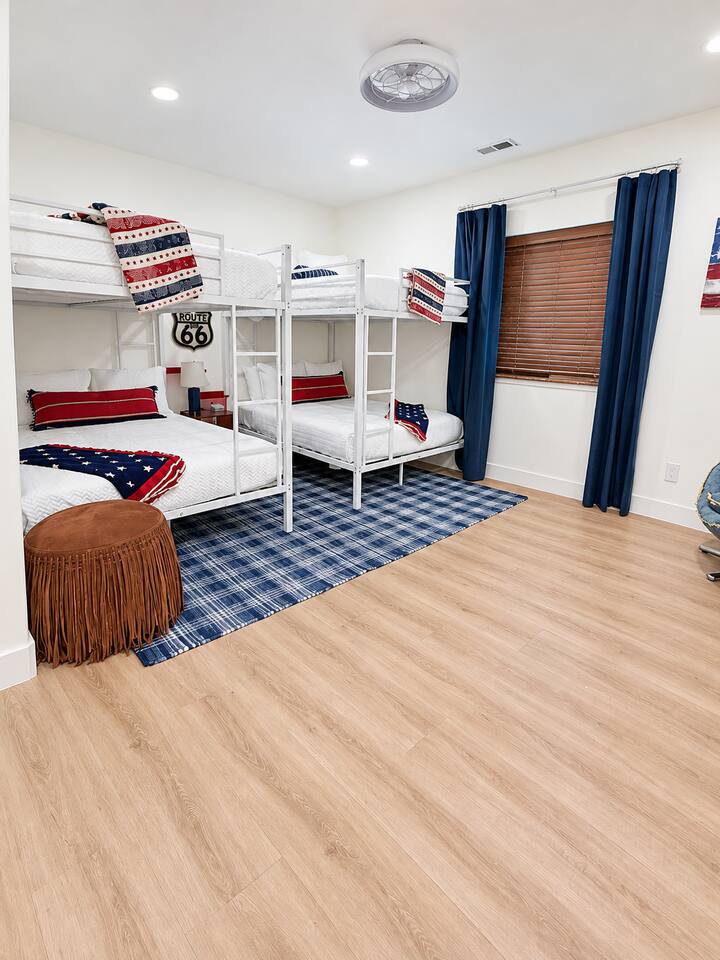 Bedroom (Lower Level) with Four Bunk Beds (Full / Full + Full / Full) and 55" TV with Roku